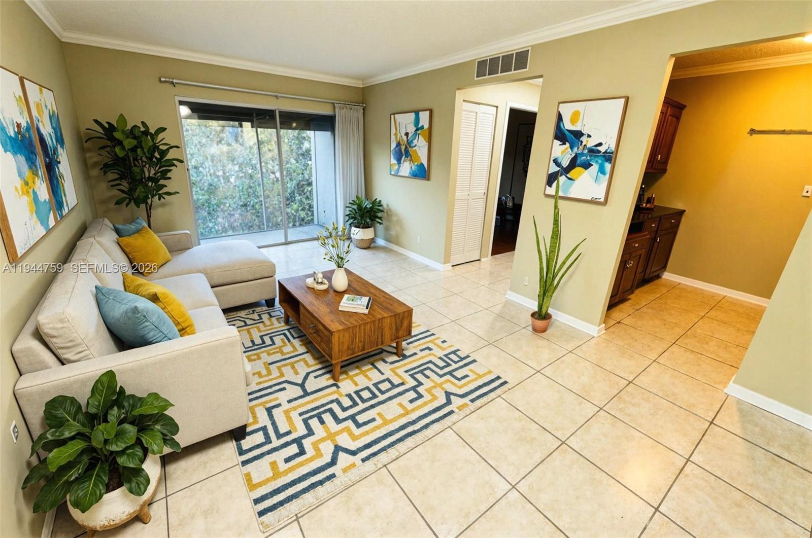 Opportunity: Discover a gem in this 1-bedroom, 1-bath second-floor condo. Ideal for savvy investors and first-time homebuyers, this property boasts modern tile and laminate floors, and one inviting bedroom. Located in a highly desirable area just minutes from Wellington Green Mall, Walmart, Best Buy, Home Depot, and an array of shopping and dining options, this condo offers not only comfortable living but also an excellent investment.----------UNIT RENTED TILL 3/31/2027, PAYS $1,500.00 PER MONTH - tenant can open the door to show the unit thursdays after 4pm