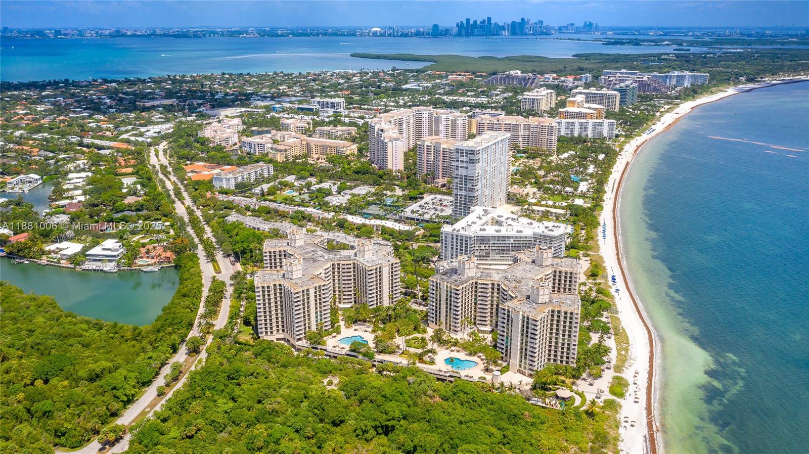 Gorgeous and serene wrap around views  of Pines Canal, Bill Baggs State Park, Biscayne Bay and Downtown Miami are hallmarks of this 1782 Sq ft island flat.
An open kitchen with direct water views, spacious laundry room and open floor plan with living and dining room are perfect for entertaining .  Residents enjoy resort-style amenities including a fitness center, several  pools, private beach access, children’s playroom, watercraft storage, on-site restaurant, billiards, and tennis courts. A unique find on Key Biscayne.  A short drive to Miami International Airport, Downtown Miami and the Design District . Island living at its best!