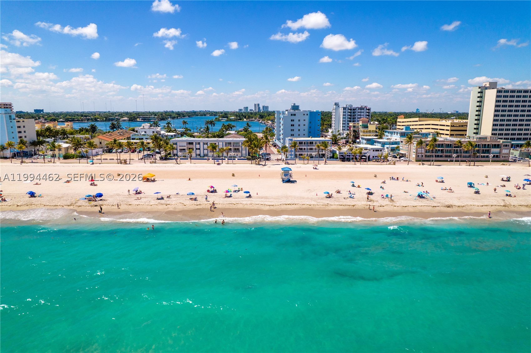 Welcome to 335 Virginia Street, a rare opportunity to own a coastal retreat just moments from the sand in the heart of Hollywood Beach. Live, vacation, or rent, the flexibility to do it all from this unique 3-story townhome offering privacy, lifestyle, and income-producing potential in an area where condos dominate.

Ideally located between the Hollywood Beach Broadwalk and the Intracoastal, this corner-lot residence offers walkable access to beaches, waterfront dining, marinas, shopping, and entertainment. Spanning three thoughtfully designed levels, the home features bright living spaces and an effortless indoor-outdoor flow perfect for South Florida living.

Enter through a spacious second-floor foyer into the main living area and beautifully renovated kitchen with waterfall quartz countertops, custom cabinetry, large pantry, and eat-in counter. The third level includes a generous primary suite with redesigned bath, plus two additional rooms and another full bath, including a guest room with ocean views and a flex space currently styled as a custom wardrobe.

Enjoy a private patio with clean-lined pavers, white privacy fencing, outdoor shower, abundant storage, and direct access to newly paved Virginia Street leading to the Broadwalk. Short-term rentals permitted with restrictions. Separate-entry first level adds flexible living and income-producing potential.