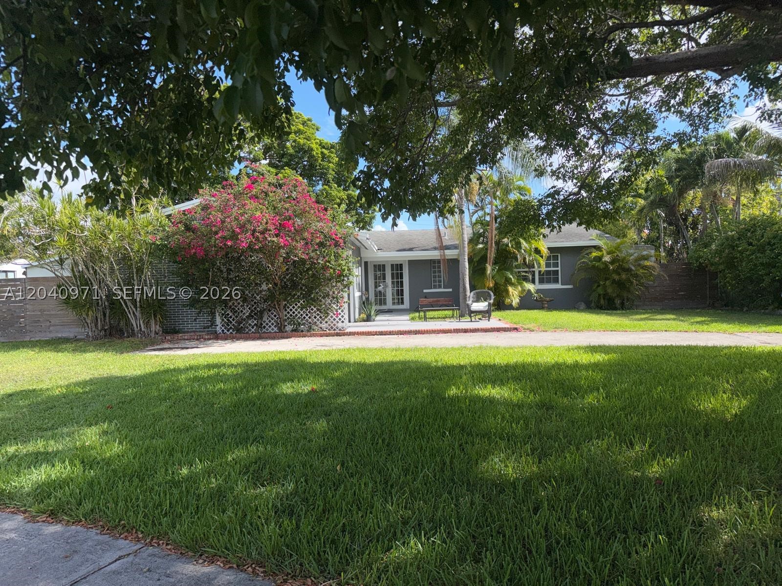 Welcome home to this light filled 4 bedrooms 2 bath resident that combines comfort, style and functionality. The bright Open interior features beautiful new laminate wood flooring and updated lighting that gives the home a fresh modern feel, the spacious floor plan offers plenty of room family guests, a home office, a circular driveway provides ample parking & great curb appeal while the backyard includes a convenient storage for tools, lawn equipment or extra storage. Fabulous location and close to Hospital, several restaurants and specialty shoppes.