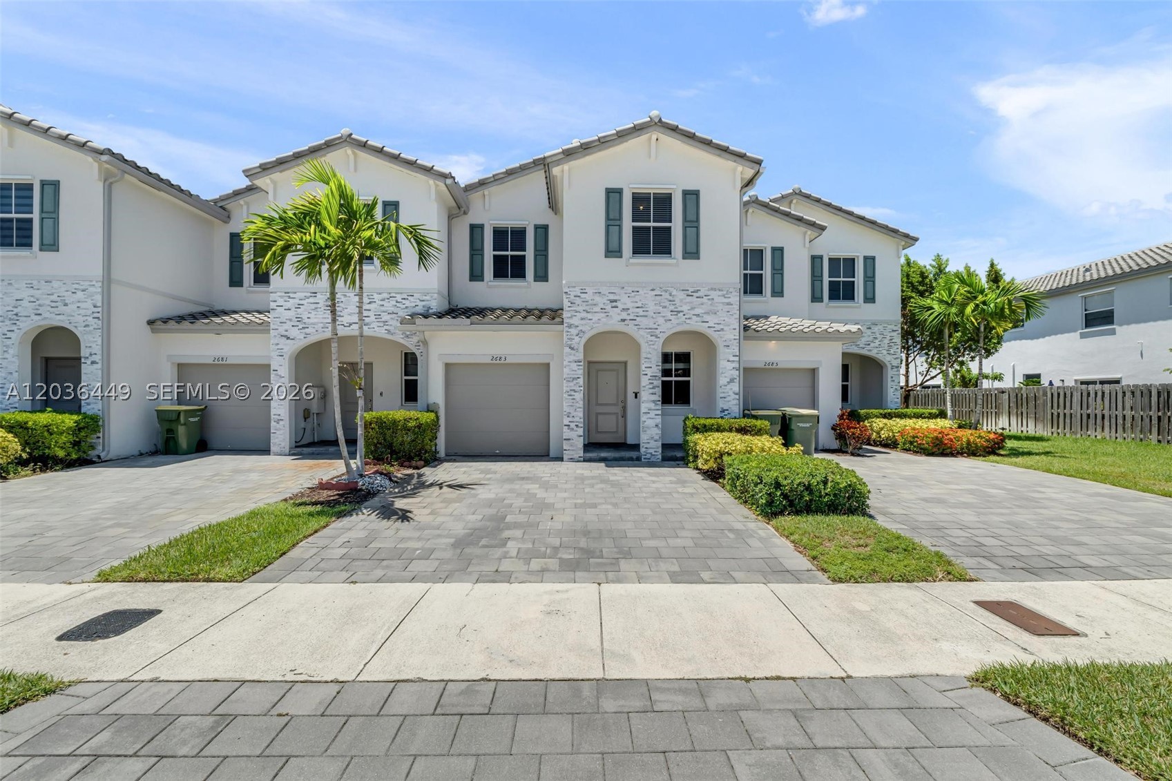 Excellent opportunity to own this beautiful two-story townhouse in Homestead's gated community, The Riviera. Standing out as one of the largest townhouse models in the community, this spacious 1,827 sq ft residential layout features 3 bedrooms, 2.5 bathrooms, and a 1-car attached garage. Built with durable CBS construction, the home offers a first-floor entry leading to a family/dining combination, a cooking island kitchen with stainless steel appliances, and tile flooring. The second floor features carpeted flooring, walk-in closets, the primary bedroom with dual sinks, and a dedicated upstairs laundry area. Outdoor spaces include a private fenced patio. Residents enjoy permanent neighborhood amenities including a community clubhouse, pool, exercise room, and bike/jog path.
