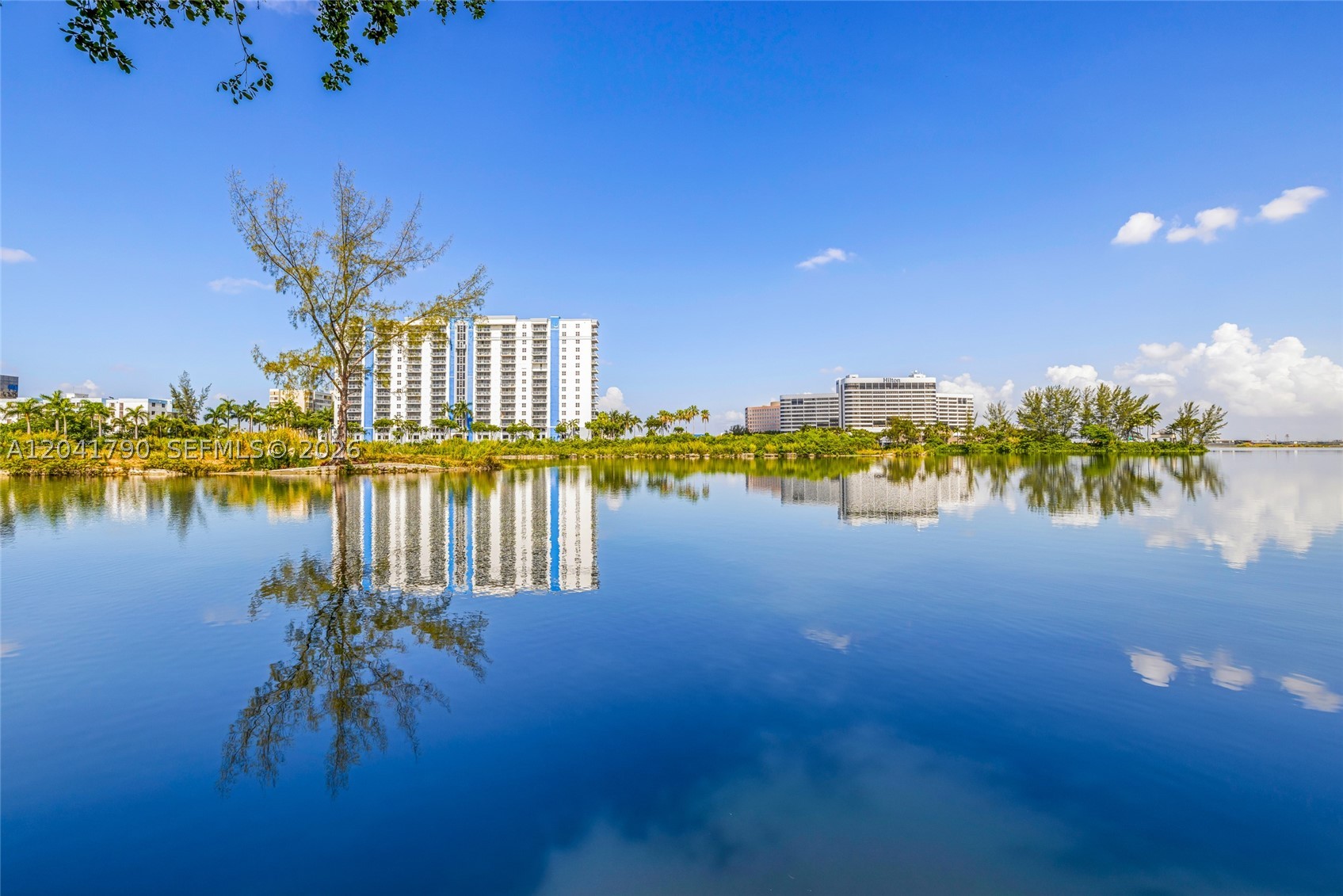 Discover this spacious condo conveniently located in Miami, just moments from MIA, Coral Gables, premier shopping, and more. This freshly painted unit features beautiful tile flooring throughout and a generous living-dining area. Nestled within a desirable gated community, residents enjoy access to a sparkling community pool, tennis courts, basketball court and walking path.
