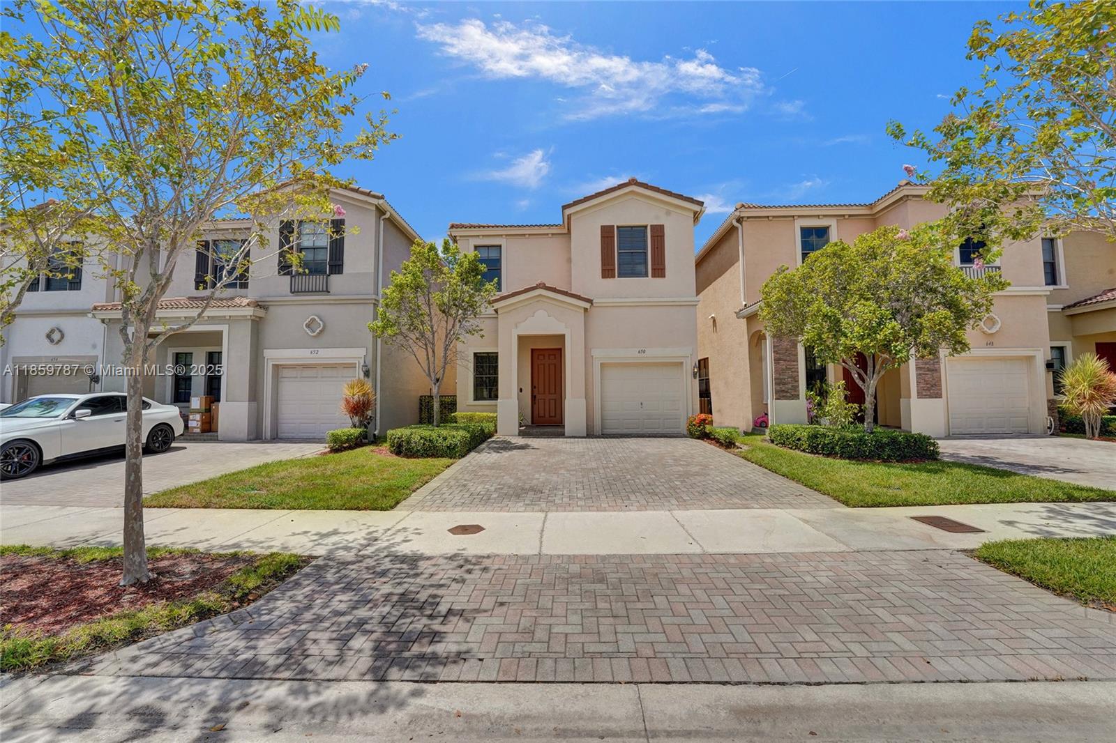 BEAUTIFUL SINGLE FAMILY HOME 4 BEDROOMS 2 1/2 BATHS AND ONE CAR GARAGE! LOCATED IN THE PRESTIGIOUS GATED COMMUNITY OF "AVENTURA ISLES" OPEN CONCEPT LAYOUT WITH TILE AND LAMINATE FLOORS THROUGHOUT, MODERN KITCHEN WITH GRANITE COUNTERTOPS, STAINLESS STEEL APPLIANCES AND PLENTY OF STORAGE SPACE, LARGE BEDROOMS WITH LOTS OF CLOSET SPACE. NICE BACKYARD WITH ROOM FOR A POOL. COMMUNITY FEATURES; TENNIS COURTS, COMMUNITY POOL, PLAYGROUND AND MORE..! MAINTENANCE INCLUDES; CABLE, INTERNET, SECURITY, LAWN AND ALL AMENITIES ***EASY TO SHOW***FOR SHOWING INSTRUCTIONS SEE BROKERS REMARKS***PRESENT OFFERS***