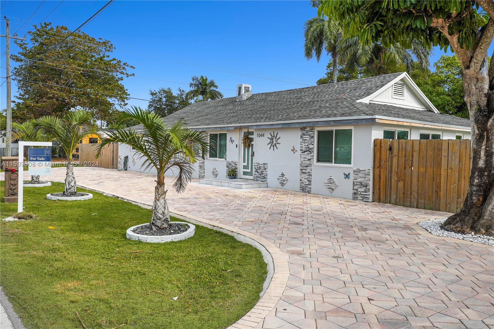 The sale includes two folios for a total of 9,933 sqft, corner lot. Folio #1: 10-7812-002-0430 (main lot with house).  Folio #2: 10-7812-002-0440 (vacant lot).  The vacant lot has 3,354 sqft.  Legally build a small house or rental apartment.  The house has 5 bedrooms and 3 bathrooms.  The house is completely remodeled - new roof in 2022, high impact windows and doors, new kitchen in 2022.  Entryway and patio have designer stone pavers.  Move in ready!