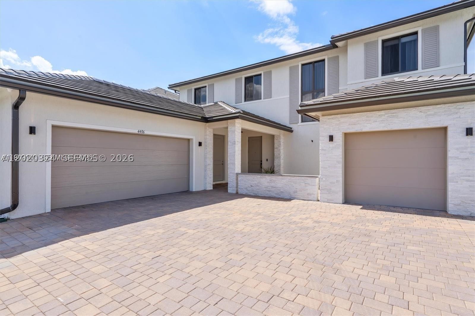 Located in the gated Marbella Miramar community, this spacious two-story home offers over 4,000 sq. ft. of comfortable living with thoughtful upgrades throughout. The home features porcelain tile on the first floor, laminate flooring upstairs, a 3-car garage with polyurea flooring, and a large driveway with space for up to 8 vehicles. The kitchen is designed for everyday use and entertaining, with granite countertops, stainless steel appliances, and a generous pantry. Downstairs, there is a flexible room with its own full bathroom, currently used as a gym, but ideal as a bedroom, office, or guest suite. Upstairs, the primary suite includes a large walk-in closet and a well-appointed bathroom with dual vanities, a soaking tub, and a separate shower. Two additional bedrooms, full bathrooms with showers, and an open office area that can be converted into a large bedroom complete the second floor. The exterior adds even more appeal with a marble facade, modern lighting, and video security. A great opportunity to own a beautifully upgraded home in one of Miramar’s desirable gated communities.