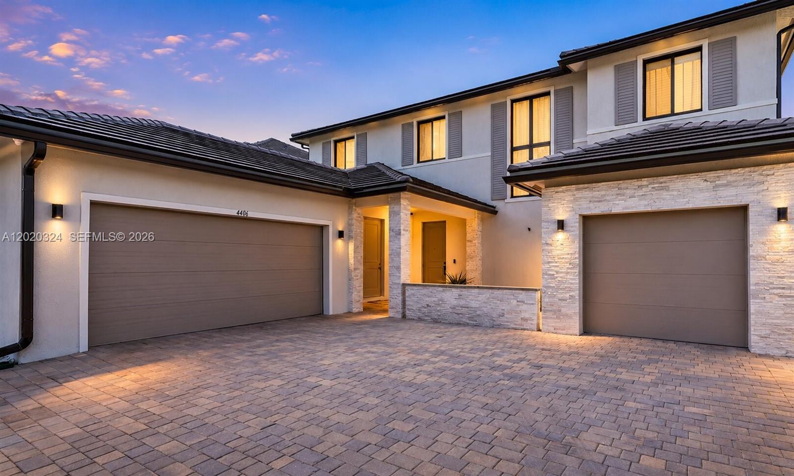 Located in the gated Marbella Miramar community, this spacious two-story home offers over 4,000 sq. ft. of comfortable living with thoughtful upgrades throughout. The home features porcelain tile on the first floor, laminate flooring upstairs, a 3-car garage with polyurea flooring, and a large driveway with space for up to 8 vehicles. The kitchen is designed for everyday use and entertaining, with granite countertops, stainless steel appliances, and a generous pantry. Downstairs, there is a flexible room with its own full bathroom, currently used as a gym, but ideal as a bedroom, office, or guest suite. Upstairs, the primary suite includes a large walk-in closet and a well-appointed bathroom with dual vanities, a soaking tub, and a separate shower. Two additional bedrooms, full bathrooms with showers, and an open office area that can be converted into a large bedroom complete the second floor. The exterior adds even more appeal with a marble facade, modern lighting, and video security. A great opportunity to own a beautifully upgraded home in one of Miramar’s desirable gated communities.