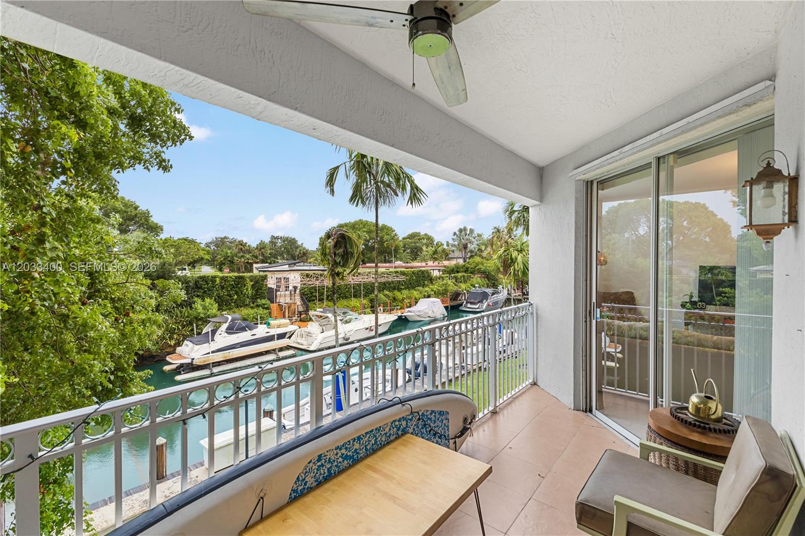 Welcome to this beautifully updated corner residence offering abundant natural light and tranquil canal views leading directly to Biscayne Bay. This spacious 2-bedroom, 2-bath home features an open-concept floor plan designed for comfortable everyday living and effortless entertaining.
The renovated kitchen showcases modern cabinetry, quality finishes, and generous workspace while flowing seamlessly into the expansive living and dining areas. Both bathrooms have been tastefully updated with contemporary fixtures and finishes.
The desirable corner location provides additional windows, creating a bright and airy atmosphere throughout the home. Relax and enjoy peaceful water views overlooking the canal, just moments from Biscayne Bay.
Ideally located in the heart of Miami Shores, you'll enjoy easy access to shopping, dining, parks, golf, marinas, beaches, Downtown Miami, and Miami Beach. A wonderful opportunity to own a move-in ready waterfront residence in one of Miami's most desirable neighborhoods. 2-garage parking space(s) #35 and #36. Garage is secured and spaces are side-by-side.