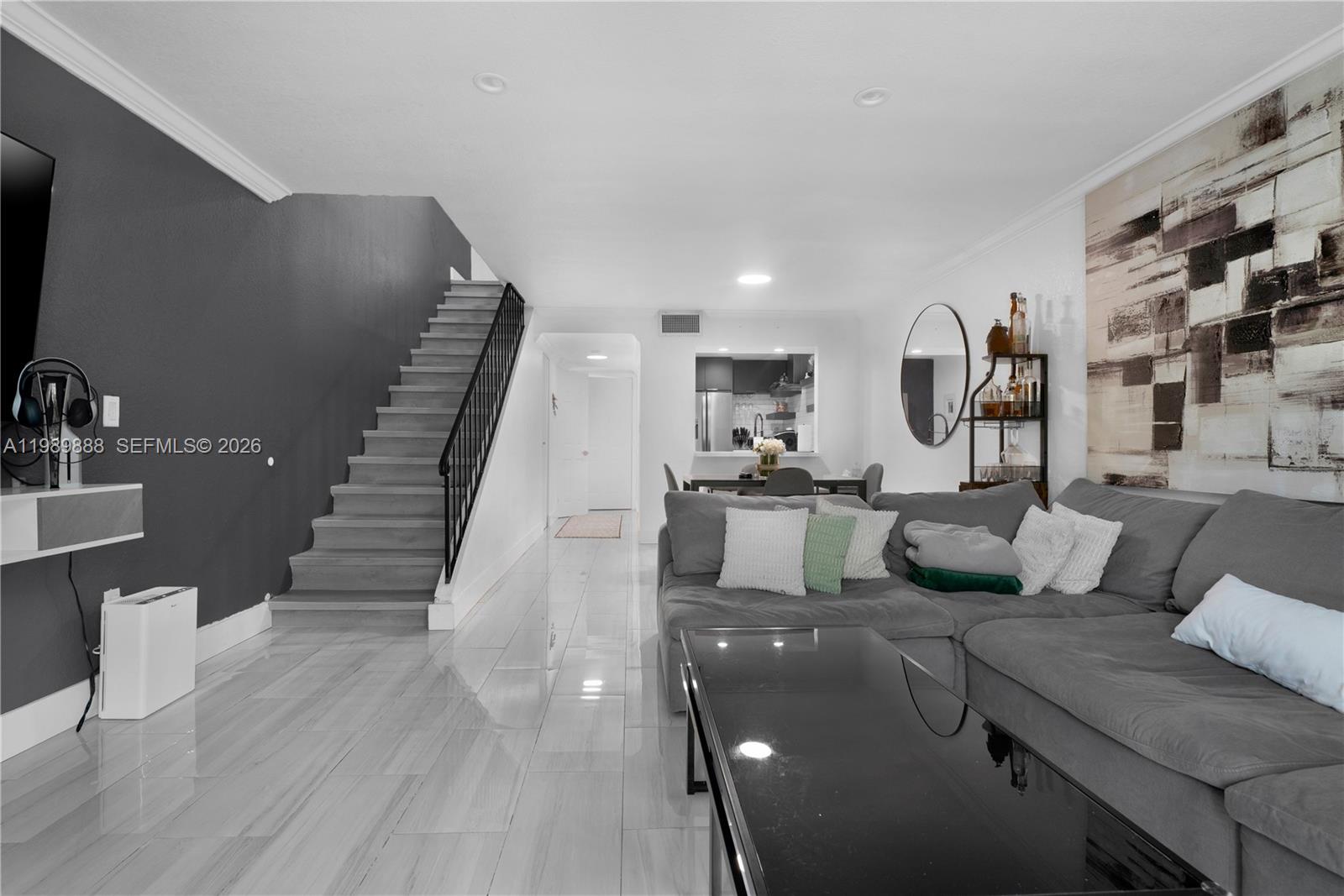 FULLY REMODELED + IMPACT WINDOWS & DOORS — BEST VALUE IN PUERTA DEL SOL!

Completely renovated two-story condo with no work needed. Featuring a brand-new kitchen with quartz countertops, modern cabinetry, and a sleek subway tile backsplash.

Equipped with hurricane impact windows and doors throughout.

Functional split layout with ceramic tile downstairs and upgraded LVP flooring upstairs. Includes 1.5 bathrooms, in-unit washer & dryer, and two private balconies for added outdoor living space.

Located in a well-maintained community with water included, assigned parking, and guest parking available.

Perfect for primary buyers or investors—properties like this do not last. Easy to show. Priced to sell.