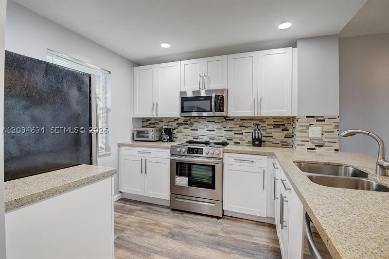 Beautiful renovated condo, new kitchen with quartz counter top, stainless steel appliances, corner unit, 2 bedrooms, 2 baths, with elevator, laundry room on the same floor. Enjoy a relaxing lifestyle on this great well maintained 55+communit, in West Boca Raton. Conveniently located near SR7/441, easy access to shopping stores, banks, and restaurants. This is a seasonal rental only—no annual rentals. It is in a prime location just  minutes from the beach. Schedule your appointment on showing time and send your offers.