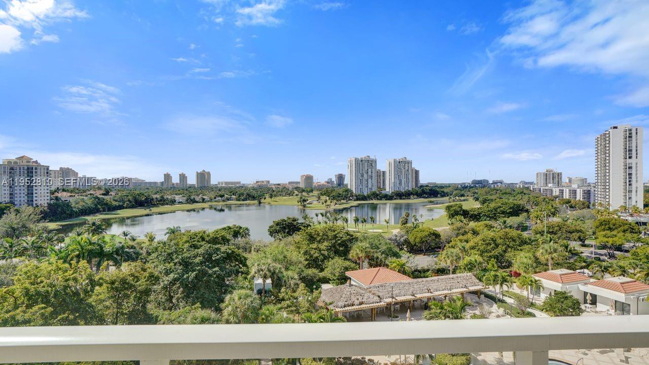 The perfect floor to see spectacular water and golf course views from every room. Split 2-bedroom, 2 bath residence. Tiled throughout, used only as a second home, formal dining, and breakfast area. Fully funded reserves. Private gourmet restaurant overlooking the Intracoastal, run by Chef Perl. High speed Internet & cable with Xfinity included. Two pools, the Wi-Fi Hamptons café, a movie theater, a fitness center, a sauna, a spa and nail salon. Racquetball courts, party rooms, a kids' playroom, a library. Hamptons West, located in the heart of Aventura, has fully funded reserves. Close to Aventura Mall, the beach, restaurants, and shopping.