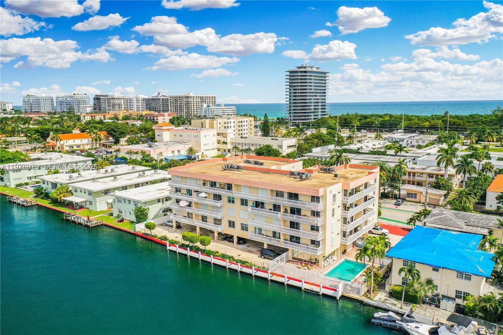 **JUST REDUCED**This Remodeled 2-Bedroom, 2-Bathroom Condominium with Intracoastal Views** IS A MUST SEE **with LOW HOA fees and is priced to sell quick! Owner is motivated! **Please go to Homes.com**Put this address & use the Matterport to walk inside the Condo** It offers a blend of modern and serene coastal living. Located  two blocks from the Beach & Parks, it provides easy access to the golden sands and sparkling waters while offering a peaceful retreat overlooking the picturesque Intracoastal Waterway. It has a spacious and bright open floor plan. The living area is bathed in natural light, thanks to large windows and sliding glass doors that lead out to not one, but Two private balconies, each offering breathtaking views of the water. Close to Bal Harbour Shops & Restaurants. Location has easy access to all Airports. The kitchen has quartz countertops & Stainless steel appliances, custom cabinetry that offers both beauty and practicality. The master suite offers a private en-suite bathroom, elegantly remodeled with modern fixtures and a luxurious walk-in shower. The second bathroom is equally impressive, with contemporary finishes. The parking is covered and gated and it comes with a small storage.

**This condominium is doing the 40 yr recertification** which includes a new roof, new elevator, & painting of the entire bldg. the Owner will pay for ALL the Special Assessments**this Property offers everything you could ever want at an affordable price for Miami Beach.