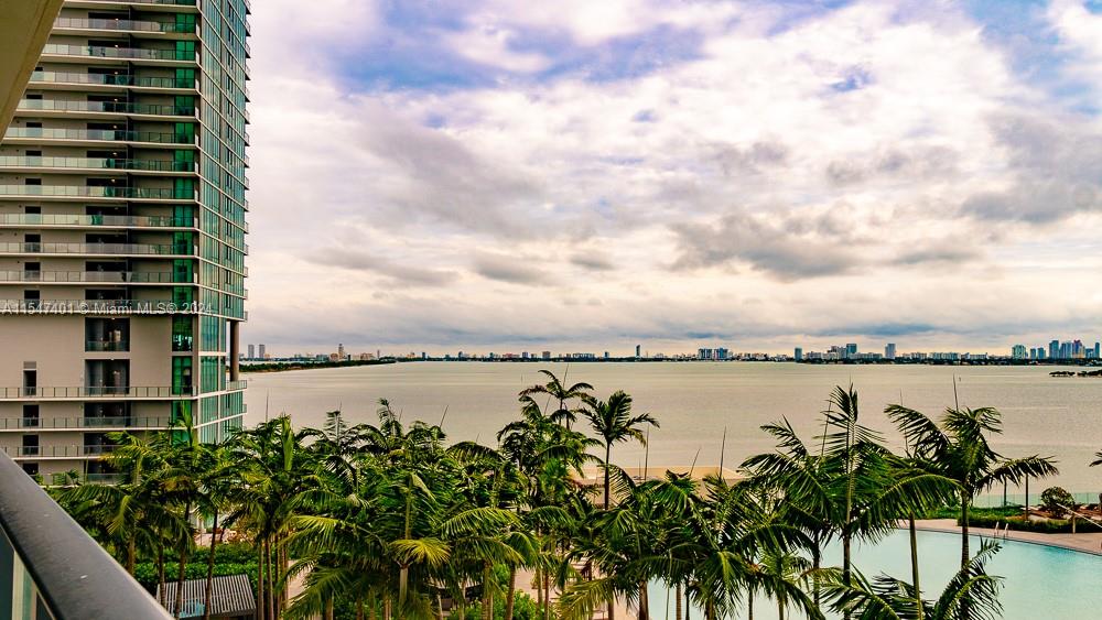Spectacular 2 bedroom + den / 3 full baths open Bay views and Pool views from oversized balcony. Built in closets, window treatments and Italian marble floors throughout. Top of the line Bosh and Subzero appliances. Paraiso District is just minutes from the heart of Miami as entertainment, Wynwood and Design Districts and famed Miami Beach. One-of-kind amenities including 2 tennis courts, bowling alley, theater room, business center, party room, state of the art gym and spa, pool, hot tub, Cigar room, wine room, treatment rooms and more. A private club for residents at the exclusive Amara restaurant by Michael Schwartz.  Close to Downtown/Brickell, highway and airport.
