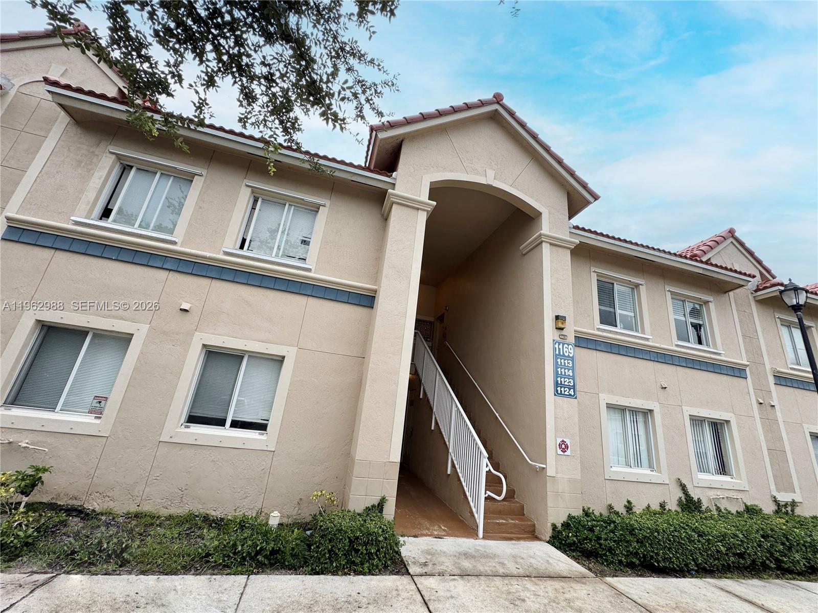 This beautiful 3-bedroom, 2-bathroom second-floor unit seamlessly combines comfort and style. Featuring tile and carpet flooring throughout, a kitchen with stunning countertops, wood cabinets, and fully functioning appliances, this condo is great to live in. Located in a quiet corner of the complex, it offers a peaceful balcony with lovely nature-preserved views. The community is investor-friendly, allowing immediate rentals, making it a fantastic income opportunity. Conveniently situated near the Florida Turnpike, I-95, shopping, schools, and the airport, this unit offers excellent accessibility and value. Don't miss out—schedule your viewing today!----------UNIT RENTED TILL 9/30/2026, PAYS $2,000.00 PER MONTH - tenant can show the unit on the weekend's afternoon