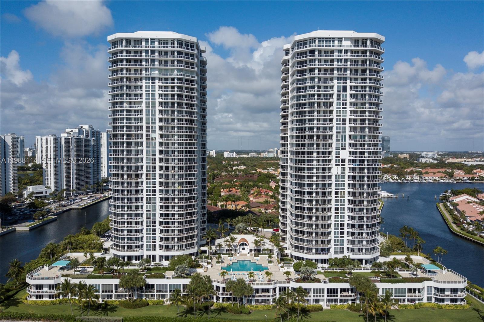 Gorgeous 3-bedroom + DEN residence with UNOBSTRUCTED VIEWS OF THE OCEAN, GOLDEN BEACH, AND THE INTRACOASTAL.  Positioned in the BEST LINE of the building – rarely available – this residence features an exceptional open and expansive floor plan, surrounded by oversized terraces, filled with natural light, and offering water views from every room.  PRIVATE ELEVATOR access directly into the residence, ensuring privacy.  ISLAND PLACE is a gated, FULLY RENOVATED LUXURY COMMUNITY set on 8 acres in the heart of Aventura.  This full-service building offers a TRUE RESORT-STYLE LIFESTYLE with amenities including tennis courts, two pools, spa, fitness center, party rooms, café, 24-hour security, and more.  For boat lovers, enjoy DIRECT ACCESS TO THE WATERWAYS MARINA.  Perfectly located just minutes from Aventura Mall, fine dining, and the beach, with convenient access to major highways and the airport.  Beautifully maintained and move-in ready. HOA INCLUDES WIFI/INTERNET AND CABLE TV.  Two assigned parking spaces.  ** A rare opportunity to enjoy the very best of the South Florida lifestyle. **