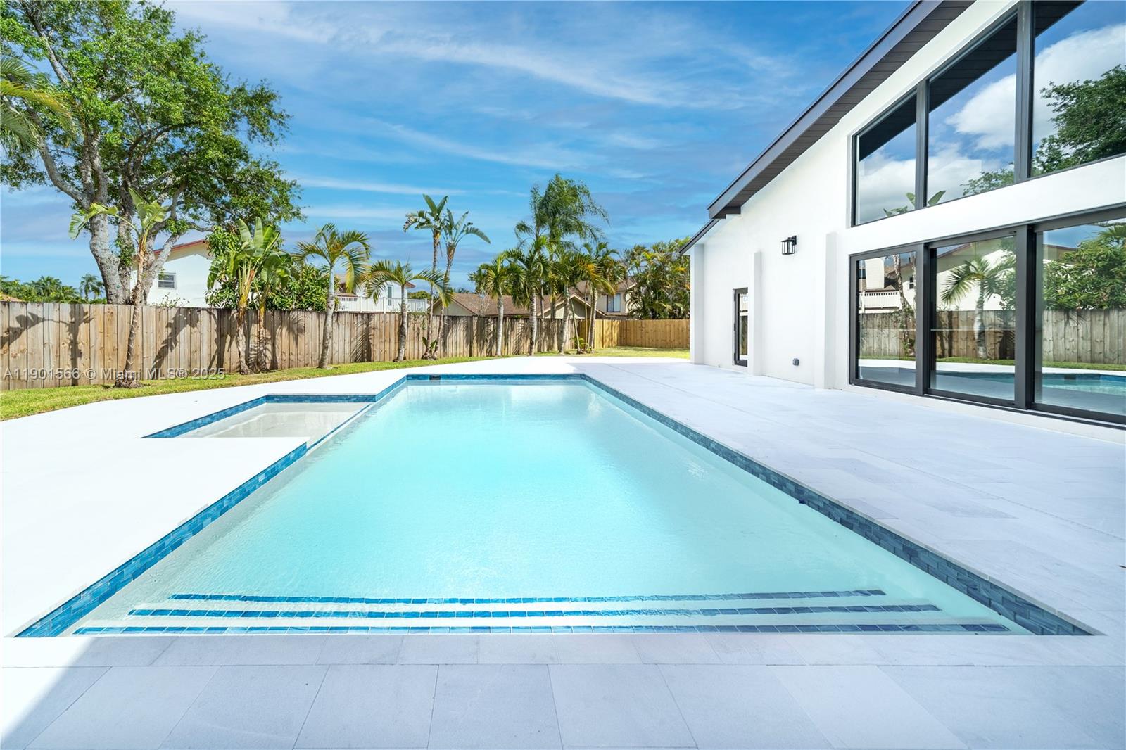 Stunning brand-new renovated 3-bedroom, 3-bath single-family home with home office and saltwater pool with marble deck. Fully updated in 2025, this residence offers a new roof, impact windows and doors, plumbing, electrical, AC, water heater, and more. The open layout showcases a designer kitchen with quartz countertops, custom cabinetry, and stainless steel appliances. The primary suite includes a walk-in closet and a spa-inspired bath with premium finishes. Enjoy outdoor living in the landscaped backyard, ideal for entertaining or relaxing by the sparkling pool. Meticulously renovated inside and out, this home delivers the comfort and quality of new construction while preserving the charm of a quiet, established neighborhood. Effective year to be updated by the Property Appraiser.