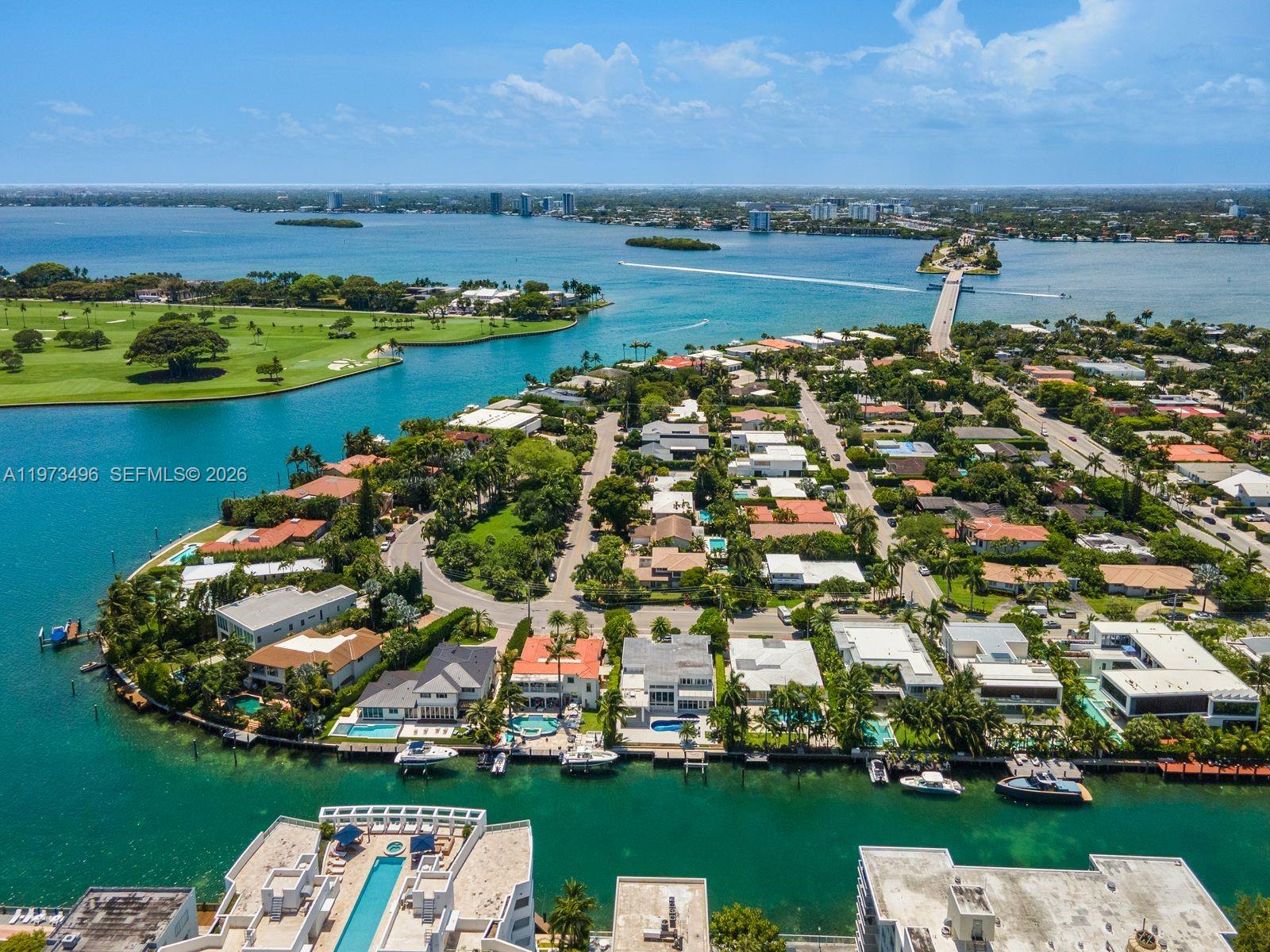 BAY HARBOR ISLANDS JEWEL, 4 BED/ 4 BATH RENOVATED MEDITERRANEAN HOME, DOUBLE HEIGHT GARAGE, HIGH CEILINGS, BASKETBALL COURT, PATIO AND POOL, LUSH LANDSCAPING. BEST LOCATION ON THE ISLAND, WALKABLE TO RESTAURANTS, SHOPS, AND FITNESS CLASSES.