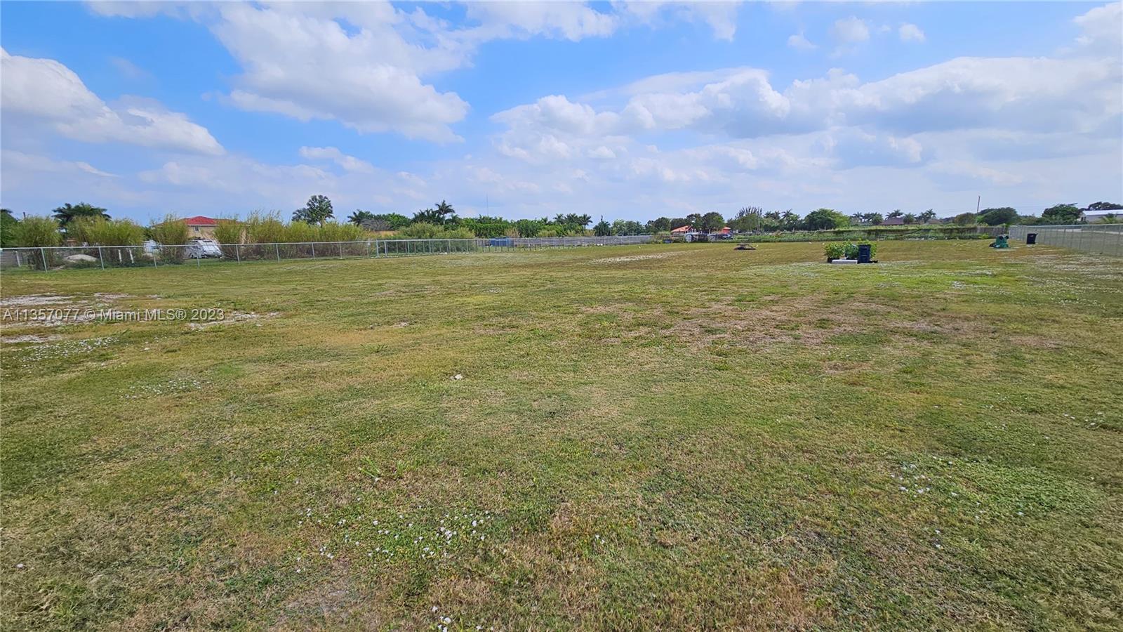 Buildable 1.3 Acre Corner Lot. PROPERTY HAS PLANS TO BUILD A SINGLE FAMILY HOME ALREADY APPROVED BY MIAMI-DADE....YOU CAN START TOMORROW. Plans are included in sale. Agricultural Zoning includes the right to build a Guest House, have stables for Horses and keep your RV and Boat on the property. This land has a Brand new Fence, an Electrical Pole with power and a water well that has DOH (Department of Health) approval. EVERYTHING WAS DONE WITH PERMITS. Don't miss this great opportunity!!! ......((((( SOMETHING LIKE THIS IS NOT EASY TO FIND ))))).....