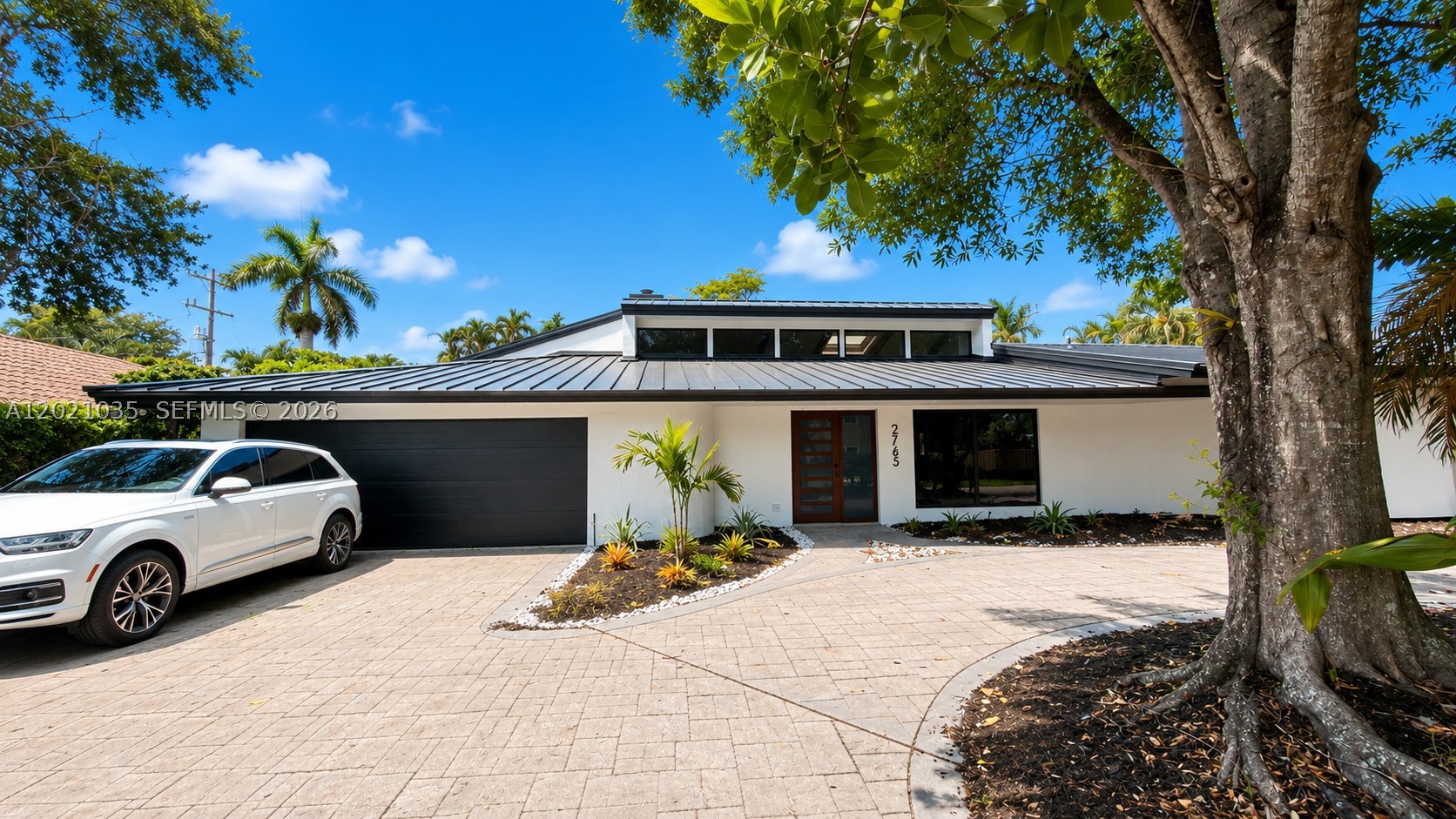 Unlock the doors to an unparalleled lifestyle in one of Fort Lauderdale’s most coveted premier neighborhoods.Nestled on an expansive 10,000+ square-foot lot, this fully remodeled, one-of-a-kind residence offers over 3,000 square feet of sophisticated living space. With 5 spacious bedrooms, 3 full bathrooms, and a large-sized garage, this home beautifully pairs classic architectural integrity with modern luxury. Massive windows bathe the home in warm, natural light.Seamless Airy living spaces are perfectly designed for effortless entertaining. A rare, oversized lot paired with a sprawling, fully updated layout.Located just moments from the exclusive Coral Ridge Country Club and Bay Colony. Minutes away from world-class beaches, gourmet dining, and high-end shopping.Opportunities of this caliber in such a sought-after neighborhood are incredibly rare.
Schedule your private tour today—this masterpiece will not last long!