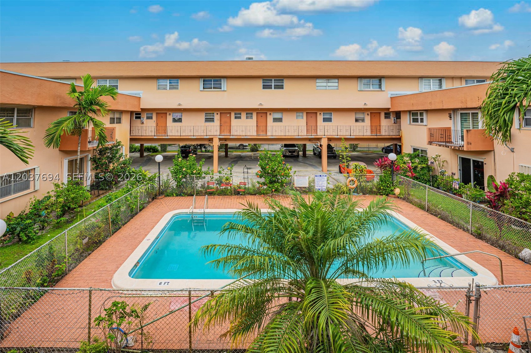 Cozy 2-bedroom, 1.5-bath townhouse-style condo in west Hialeah. This move-in-ready unit features a combined living and dining area, tile flooring in the main living areas, and brand-new carpet throughout the bedrooms. The spacious primary bedroom includes a walk-in closet, and there is plenty of additional storage with attic space. The community offers covered parking, guest parking, a pool, and an on-site laundry facility. Ready for immediate occupancy!