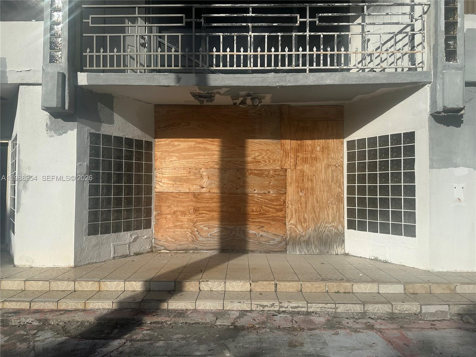 This two story water front home is a great opportunity. It is a 4 bedroom//4 bathroom fixer upper property with access to the ocean and in ground pool. It is on 9375 SF lot and 5656 building area. The property needs major repairs.