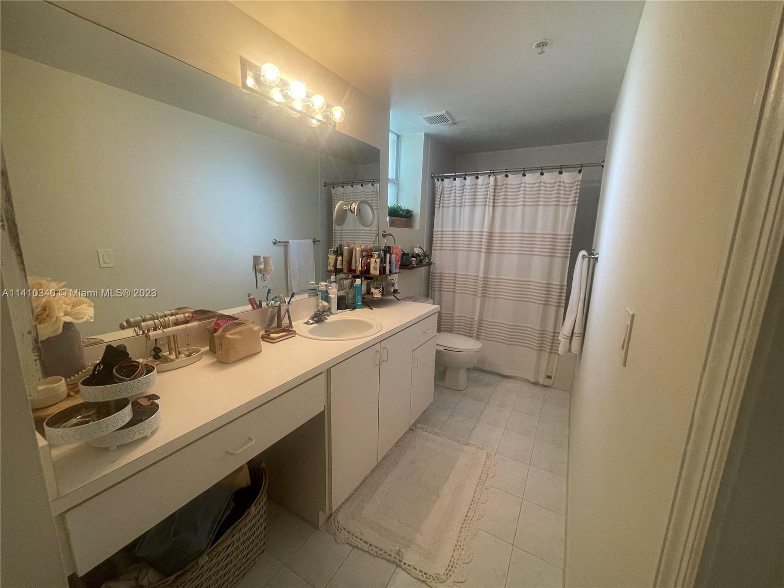 THE COURTS AT DORAL ISLES - Residential Lease