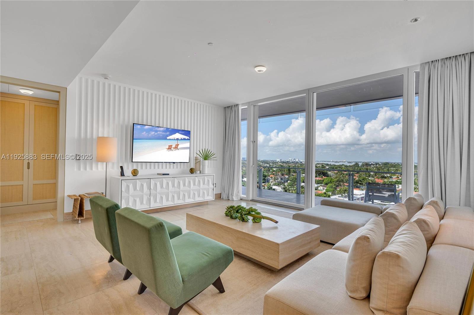 Enjoy FOUR SEASONS HOSPITALITY in this RARELY AVAILABLE 2 Bedroom, 2.5 Bathroom HOTEL RESIDENCE at the iconic Four Seasons Surf Club. This is a true income-producing investment, as the residence participates in the prestigious Four Seasons Rental Program, generating revenue for the owner while being rented daily as one of the upgraded suite categories at The Surf Club. All operations, bookings, and management are handled entirely by Four Seasons. 

Showcasing stunning city views through expansive floor-to-ceiling windows, this beautifully appointed residence blends modern elegance with effortless living. The refined open-concept layout includes a luxurious entertaining area and a fully equipped kitchen, creating the perfect pied-à-terre.

Both bedrooms feature spa-inspired en-suite bathrooms with designer finishes, offering serenity and privacy. When not in residence, owners enjoy flexible participation in the Four Seasons–managed rental program, maximizing occupancy and revenue potential.

Residents benefit from world-class Four Seasons amenities, including fully serviced pools and beach, exclusive fitness centers, multiple dining options, including The Surf Club Restaurant by Thomas Keller, a full-service spa, boutique shopping, and the unmatched Art of Hospitality that defines this legendary oceanfront property.