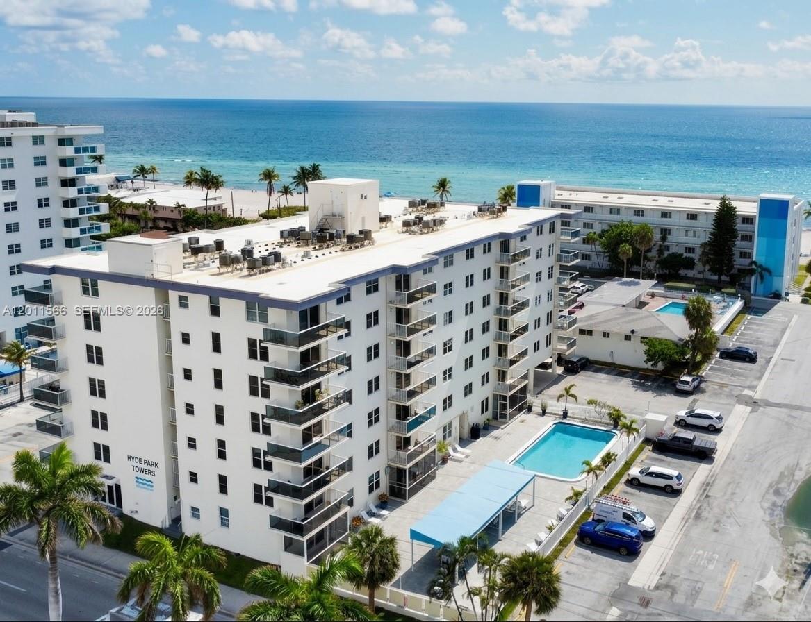 LOCATION truly doesn’t get better than this!! Beautifully renovated 1BD/2BA residence on prestigious Ocean Drive in the heart of Hollywood Beach, just steps from the sand and famous Broadwalk. This light-filled unit features a modern open layout with spacious living and dining areas, a stylish kitchen with stainless steel appliances, granite countertops, breakfast bar, and ample cabinetry, plus durable wood-look vinyl flooring throughout. The oversized bedroom offers a large walk-in closet and en-suite bath, with an additional bathroom for guests. Enjoy ocean views from your private balcony - perfect for morning coffee or evening relaxation. Additional highlights include recently replaced A/C, assigned parking, and extra storage.

The building has successfully completed its 50-year certification with major upgrades already done, including concrete restoration, new roof, impact windows and doors, and updated balconies. Residents enjoy amenities such as a pool, BBQ area, cabana bath, and clubhouse in a well-maintained, quiet setting. Ideally located near dining, shopping, supermarkets, and places of worship. Experience easy, low-maintenance coastal living in one of Hollywood Beach’s most desirable locations.

NO RENTALS PERMITTED IN BUILDING