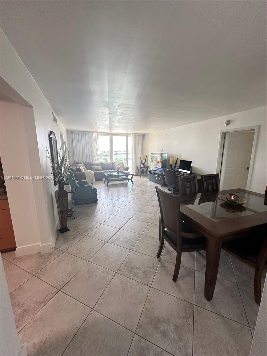 Great for Investor!!!! Stunningly renovated condo at Arlen House East, boasting a spacious open balcony and Hurricane Proof Windows, ensuring both comfort and safety. Positioned just steps away from the beach, this unit features 2 bedrooms and 2 bathrooms, with sleek tile flooring throughout. The building offers a wealth of amenities, including a sparkling pool, well-equipped gym, indulgent spa, relaxing sauna, convenient library, valet parking, and round-the-clock security. Enjoy the luxury of immediate rental availability upon closing. Experience beachside living at its finest!