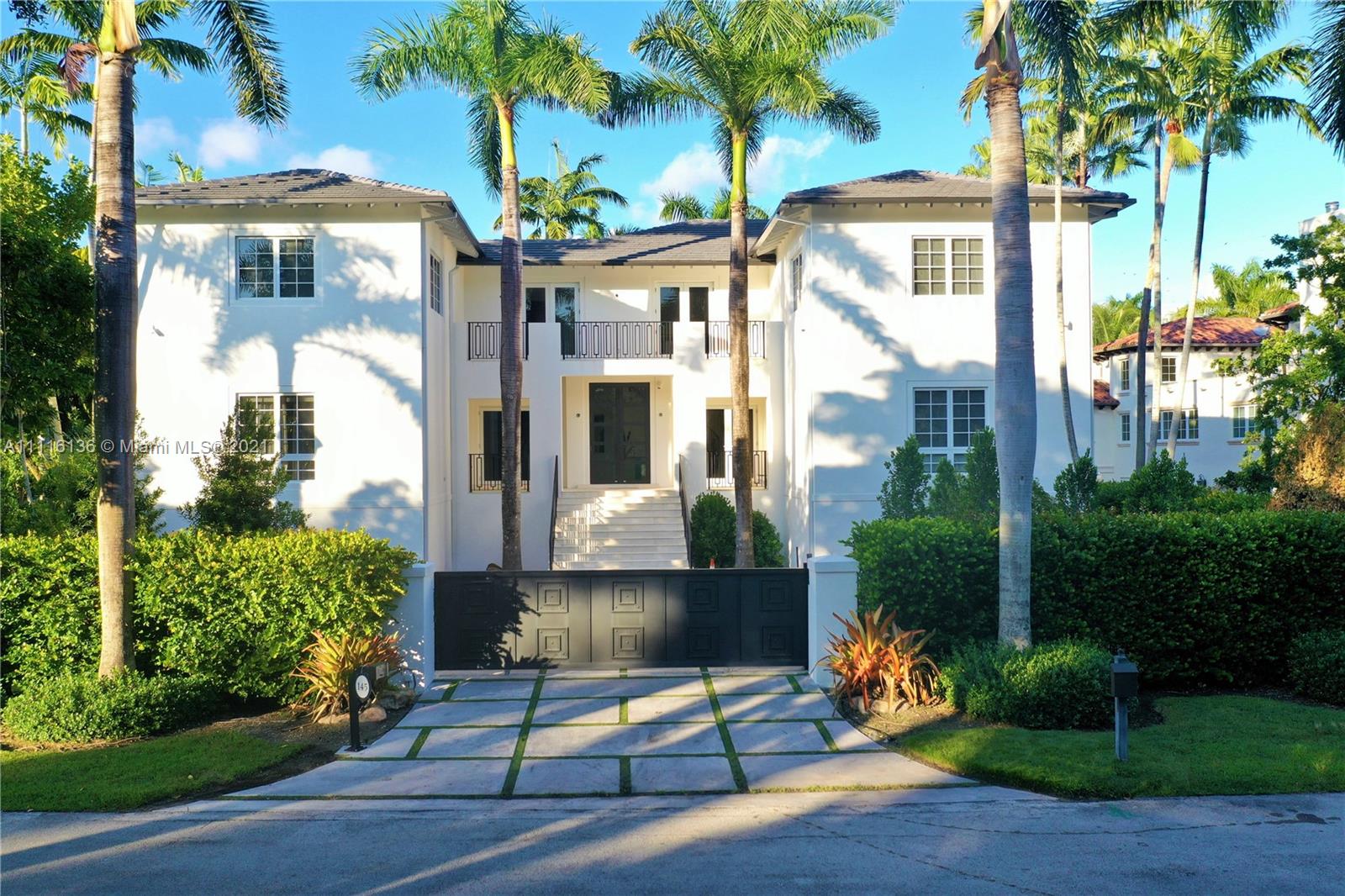 Nestled on a 22,107 sq ft corner lot in the prestigious Coral Gables guard-gated community, Islands of Cocoplum. This sumptuous 8,124 sq ft Mediterranean inspired residence features 5 bedrooms and 7.5 baths, staff quarters, and bonus room that serves as a quiet retreat with separate steam room and sauna, or a dedicated space for easy poolside entertaining. Interior professionally designed by Steven G with exposed beam vaulted ceilings, foyer entry, formal dining, and marble floors throughout. Spacious custom chef’s kitchen. Covered patio and multiple balconies overlooking the perfectly manicured yard and sparkling pool. Amenities include 5 car garage for car enthusiasts. Walking distance from the Club House.