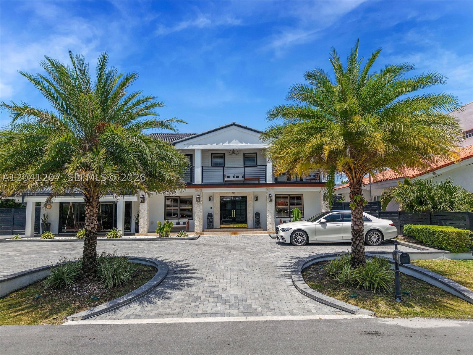 Welcome to Eastern Shores, one of South Florida's most desirable gated waterfront communities. This spacious 5-bedroom, 5-bath residence offers the perfect blend of comfortable family living and the South Florida boating lifestyle. Situated on a quiet street with 55 feet of waterfront, the property features direct ocean access with no fixed bridges, making it ideal for boaters of all sizes.

Inside, you'll find generous living spaces filled with natural light, including multiple areas for entertaining, relaxing, and working from home. The flexible floor plan includes a bedroom and 2 full baths (1 cabana + 1 guest) on the first floor, ideal for guests, in-laws, or a home office. The spacious primary suite offers a private retreat with a large walk-in closet and an oversized bathroom.

Step outside to your own tropical backyard oasis featuring a sparkling pool, waterfront views, and plenty of room to entertain family and friends year-round. Whether you're enjoying morning coffee by the water, hosting weekend gatherings, or heading out for a day on the boat, this home delivers the lifestyle buyers are searching for.

Eastern Shores is a gated community conveniently located near Sunny Isles Beach, Aventura Mall, parks, dining, shopping, and major highways. A rare opportunity to own a spacious waterfront home in a prime location with endless potential to make it your own.