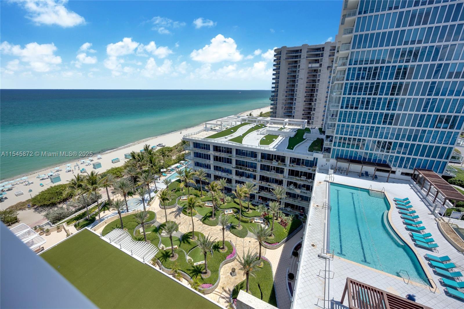 Expansive, amazing Ocean, Sunset and Pool Views! All white and bright, modern, Open concept floor plan. 2 BR opens for maximum views to the water, garden and more. Lots of storage. Brand new automatic blinds in all rooms. Top of the line finishes. Private entrance, lobby, valet in #1 Rated Wellness Residences.70,000 SF Gym, Hydrotherapy, 4 Pools, 2 Pilates Studios, 100's of classes weekly, Michelin Star Pop up Restaurant, Juice Bar, Rock Climbing Wall, Private Beach. Ownership includes nearly 70k annually in Wellness & Spa benefits, that no other oceanfront property offers! Maintenance comes with approx 70k/annually in Spa,Food & Wellness benefits: 8 Memberships, credits and more! There is no property that offers so much!