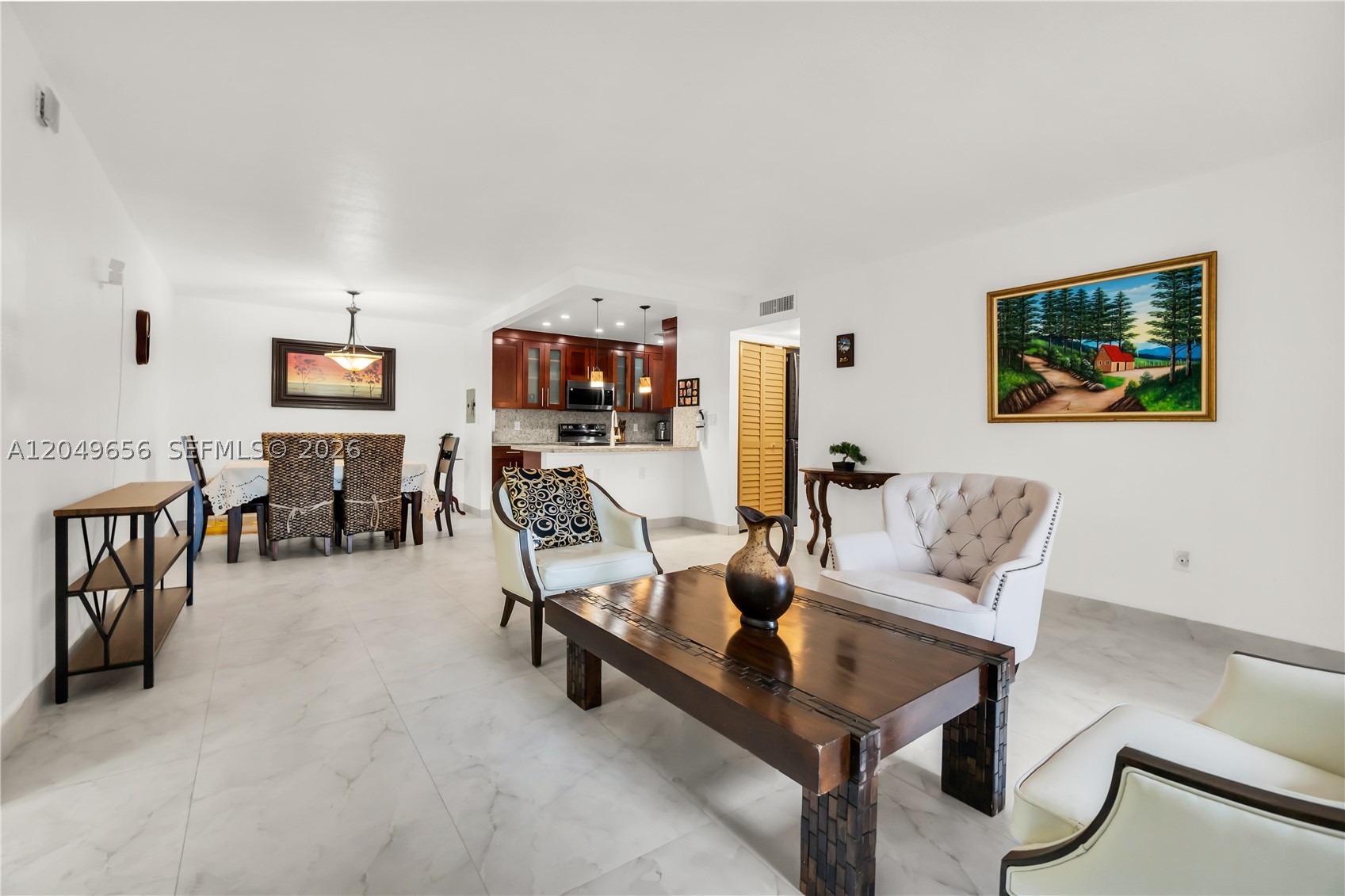Welcome to this beautifully updated 3-bedroom, 2-bathroom corner unit condo offering 1,240 sq ft of comfortable living space and a private porch to enjoy the outdoors.

This move-in ready home features newly installed faux marble flooring throughout, an updated kitchen with a brand-new stove, microwave and newer refrigerator, renovated bathrooms, a refurbished A/C system, and a new in-unit washer and dryer. The spacious primary bedroom includes a walk-in closet, offering plenty of storage and functionality.

As a corner unit, enjoy added privacy and natural light throughout the home. The unit also comes with two assigned parking spaces and plenty of guest parking for visitors.

Community amenities include a pool, tennis court, and clubhouse. With no current special assessments and a low HOA fee of $495/month, this home offers an affordable opportunity to enjoy spacious living with convenient community amenities.

A spacious, updated home with modern finishes, convenient features, and everything you need to move right in.