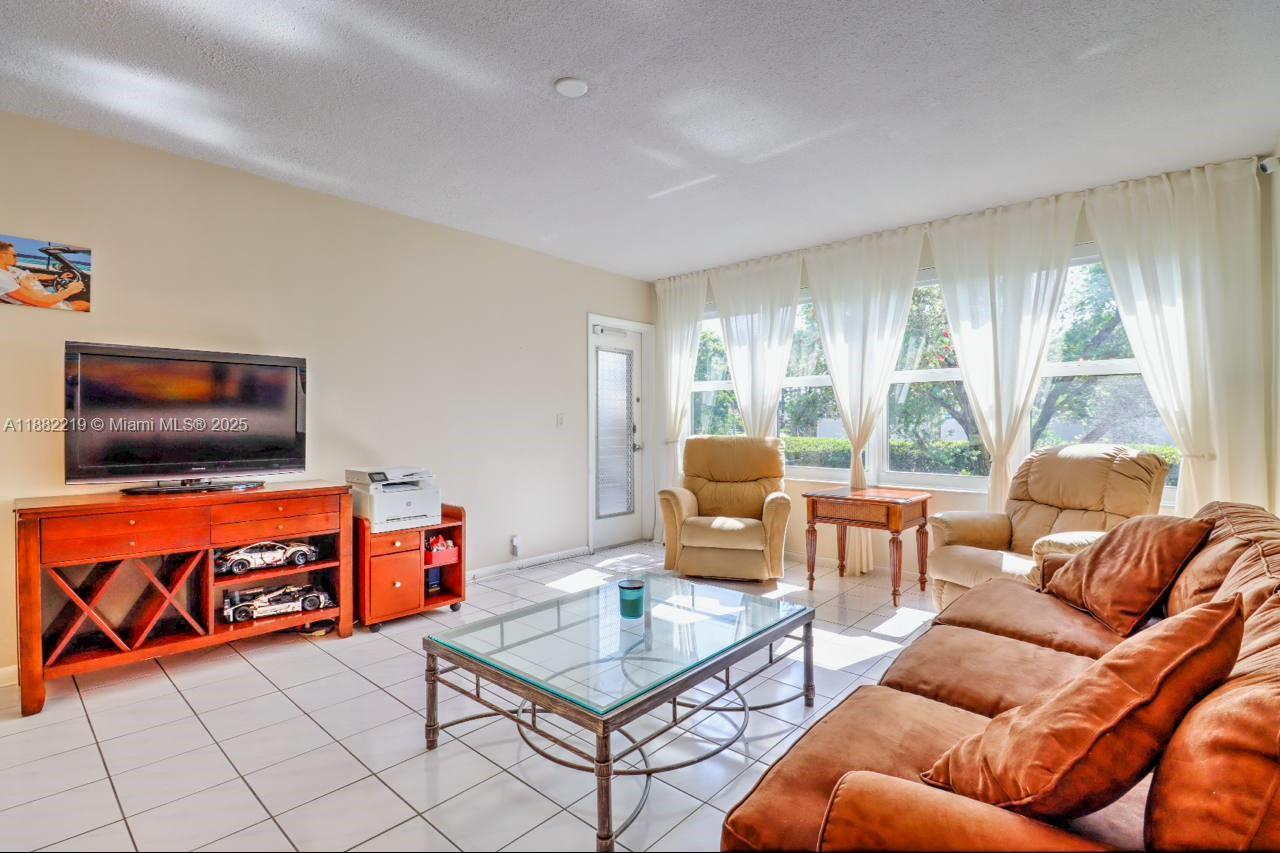 Remarks
Remarks: Spacious (1071 sq. ft.) and well-lit unit offering a charming garden view. The unit features large rooms filled with natural light, ample closet space, and additional storage in the laundry room. Includes one assigned parking space and free guest parking. This is an excellent opportunity to reside in the heart of Hallandale, just a mile driving from beaches, US1, and shopping destinations like Walmart, Publix, and CVS. Nearby are Gulfstream Village, shopping plazas, restaurants, only 20 minutes driving from the airport, and 30 minutes to Miami Beach. Available Furnished or Unfurnished . Located in a tranquil residential neighborhood. Seasonal or annual rentals are permitted after two years of ownership. Contact us today to schedule a viewing.