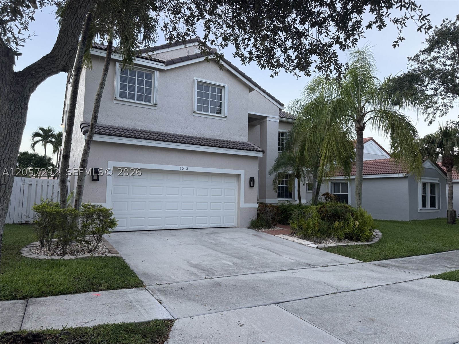 Welcome to life in The Falls, one of Weston's most sought-after guard-gated communities. This beautiful move in ready *New Roof* 4 Bed plus Den, 2.5-bath pool home offers the perfect combination of space & an unbeatable location. The moment you walk in you're welcomed by soaring two story ceilings in the formal living room that create a bright open feel & flow seamlessly into the dining area & kitchen. Freshly Painted inside & featuring newer appliances, 2022 & 2023 HVACS, 2022 Water Heater- this move in ready home offers a clean, modern feel with plenty of room for everyday living. Outside you have a private fully fenced backyard with a sparkling pool, screened lanai perfect for enjoying South Florida's year-round sunshine. Living in The Falls means enjoying a true community lifestyle with tree lined streets shaded by majestic oak trees & scenic walking trails. Residents enjoy a community pool, cabana, basketball & volleyball courts & beautifully maintained common areas. Ideally located near the highly acclaimed Eagle Point Elementary School, consistently recognized among Broward County's top-rated schools & zoned for A+ schools. Weston continues to be one of South Florida's most desirable cities, known for its exceptional schools, safety, beautiful parks, and outstanding quality of life. Just minutes from I-75, this home offers convenient access to Fort Lauderdale-Hollywood International Airport, world class shopping, dining, parks, and recreational facilities.
