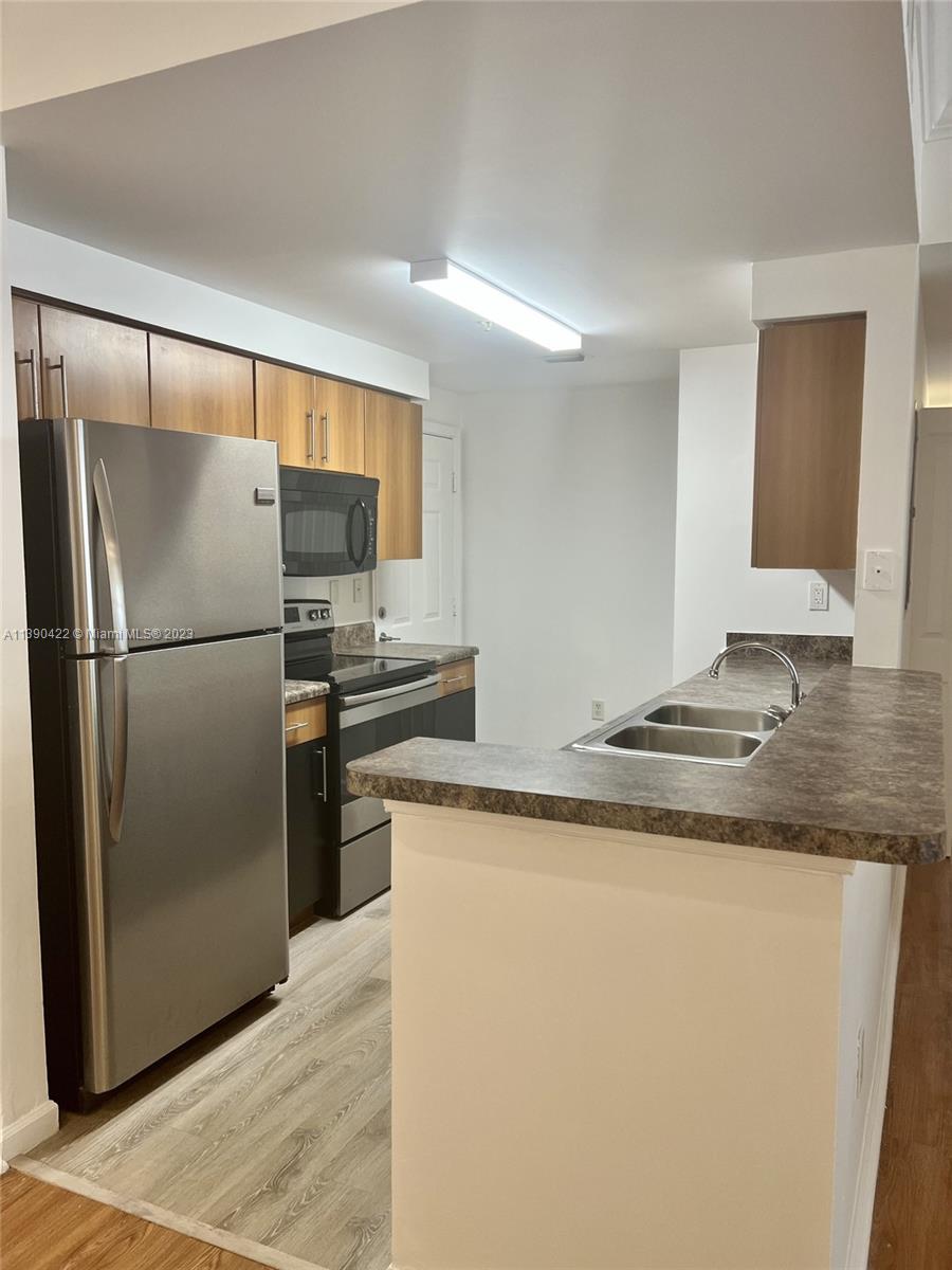 EL-AD POINCIANA CONDO - Residential Lease