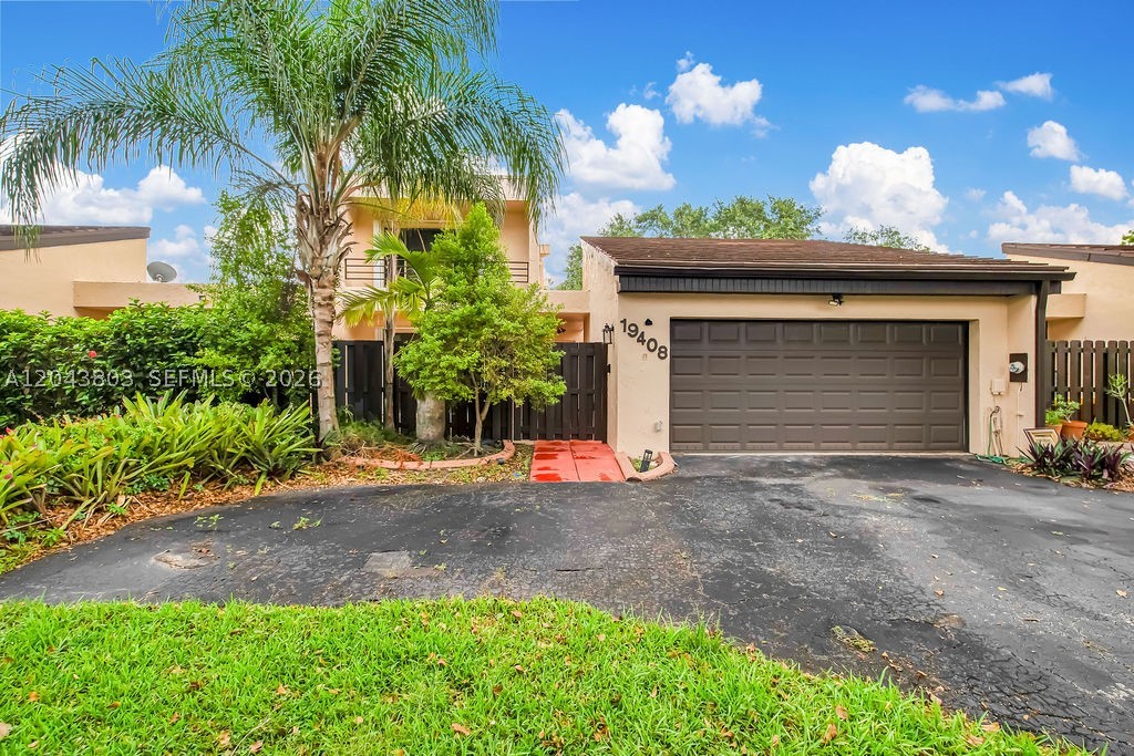 Opportunity awaits in the highly sought-after Country Club of Miami! This spacious 4-bedroom, 2-car garage townhouse offers incredible potential for buyers looking to customize and add value. Nestled along the golf course, enjoy peaceful fairway views and a tranquil setting from your own backyard. With a functional floor plan and generous living spaces, this home is the perfect canvas to create your dream residence. Conveniently located just minutes from the Florida Turnpike, shopping, dining, parks, and top-rated schools, you'll enjoy both privacy and accessibility. Bring your vision and make this rare golf course opportunity your own!