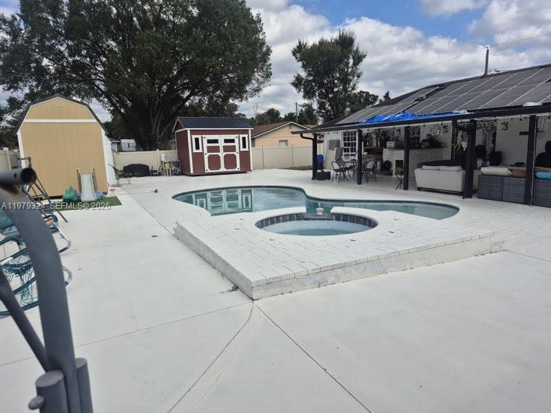 SHORTSALE OPPORTUNITY! Welcome to your private North Lakeland retreat. This spacious 4-bedroom, 2-bath home is a Florida entertainer’s dream, featuring a fully fenced yard and a massive screened pool area with an expanded concrete deck. The built-in outdoor kitchen and grill area make weekend BBQs a breeze. Enjoy the freedom of NO HOA and the efficiency of a gas system and water softener. Includes a backyard storage shed and ample parking. Perfectly located with quick access to I-4, making commutes to Tampa or Orlando seamless. Sold as a short sale—bring your offers!