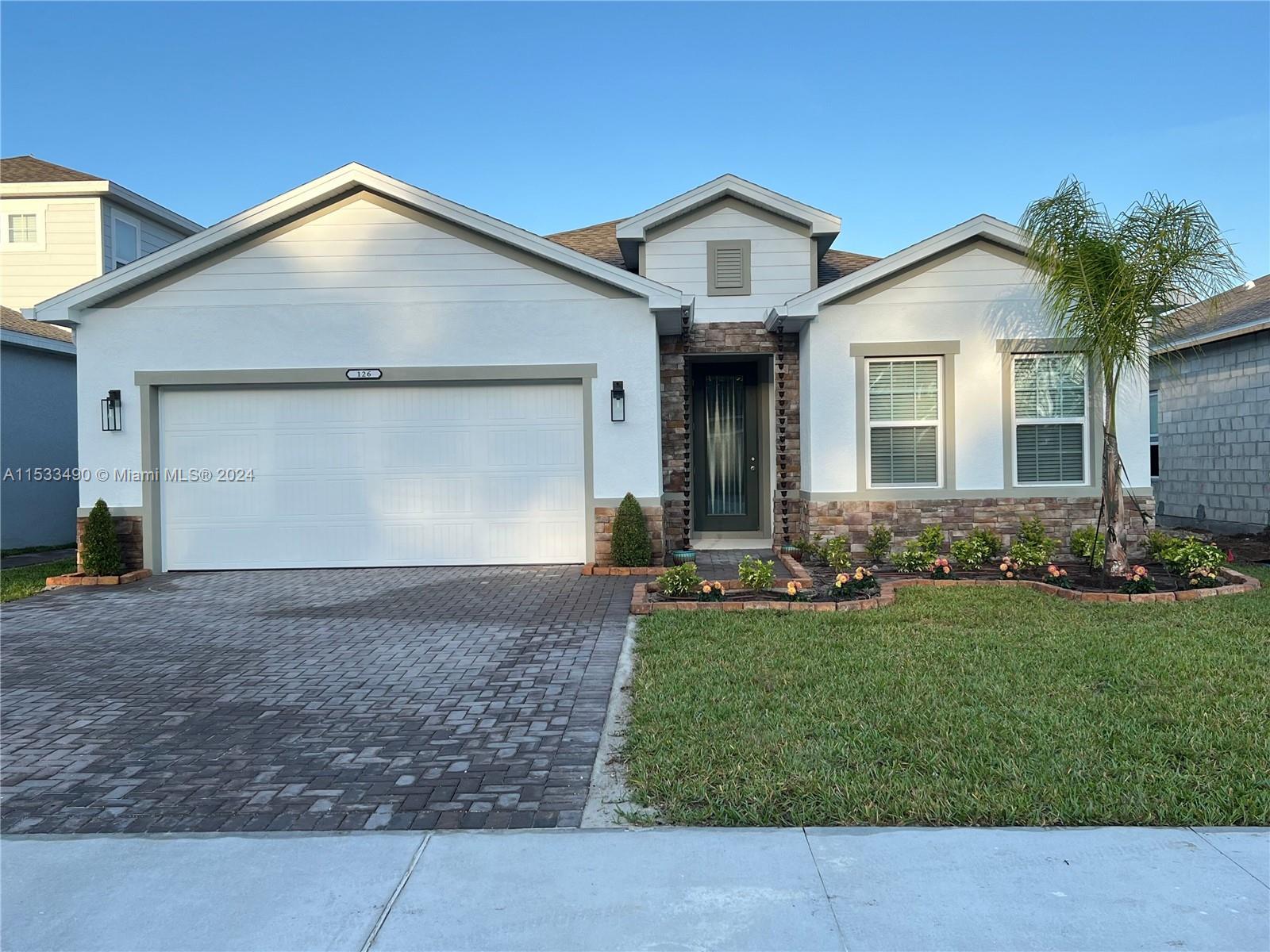 NEW!  This beautiful 4-bedroom 2-bathroom spacious family home is perfect for a family looking for a great neighborhood close to great schools.  This serene lakefront home is located in Eagle Crest which features a children's playground, resident dog run, and private lakefront nature trail that accesses Tiger Bay State Forest.  The property boasts all new appliances, tons of storage, a spacious master walk in closet, and 2 fruit trees.  This small family friendly neighborhood has only 126 homes which allows for plenty of peaceful privacy.  The yard has been fenced in so your little ones are safe to play outside while you relax and stare and the beautiful lake.  This home is perfect for those wanting to be close to nature yet minutes away from the beach and all Daytona has to offer!