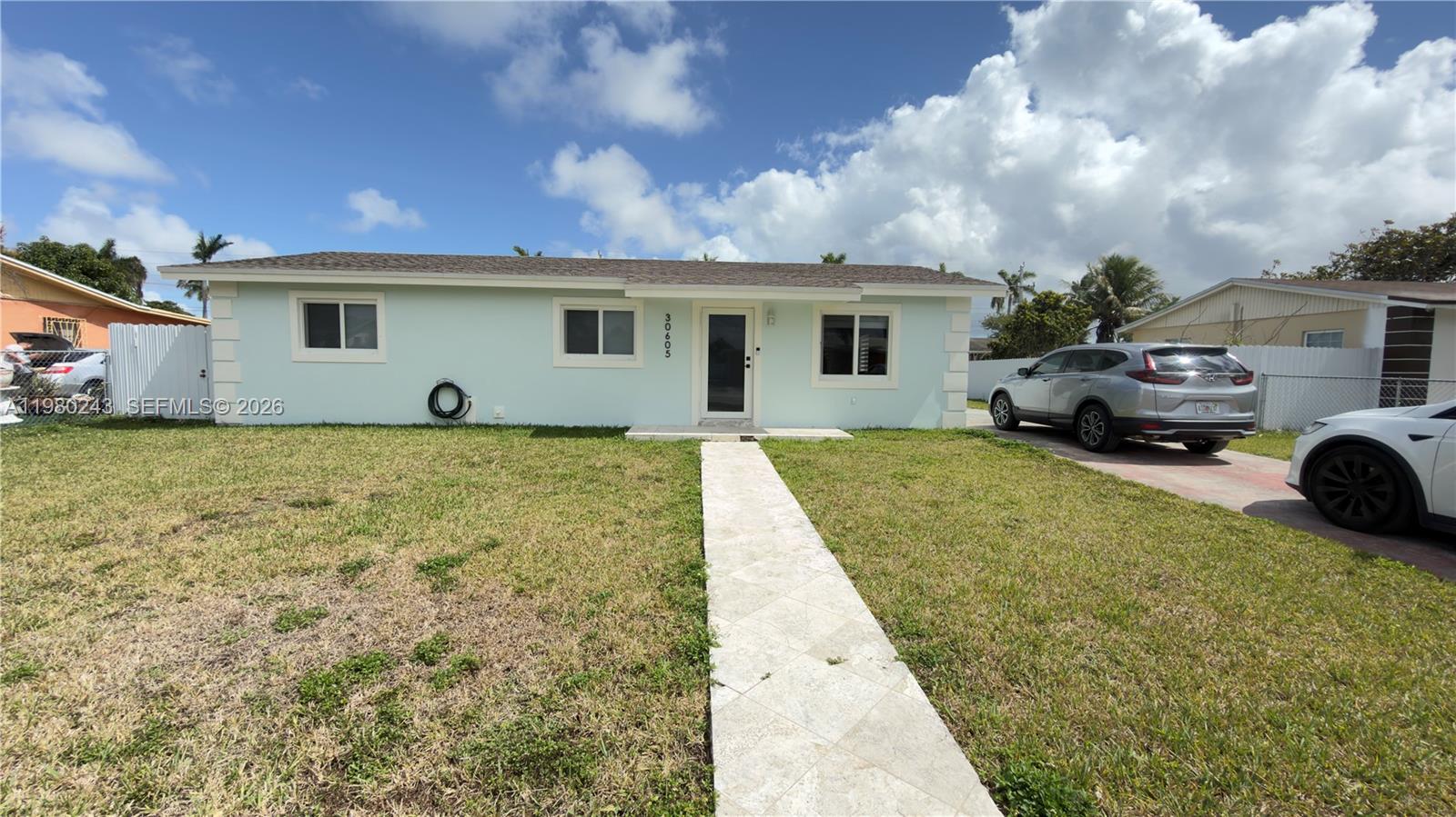Beautiful one-story single-family home located in the growing city of Homestead, Florida. This well-maintained property features sits on a spacious 7,500 sq. ft. lot, offering plenty of room for comfortable living both inside and out. The home features a modern kitchen with stainless steel appliances, creating a stylish and functional space perfect for everyday cooking and entertaining. It also includes impact windows and doors for added safety and efficiency, along with an electric tankless water heater for continuous hot water. Enjoy outdoor living with a terrace ideal for gatherings and relaxation. The generous lot provides plenty of space to park a boat or RV, and even room to build a pool or create your dream outdoor entertainment area. Another major benefit of this property is NO HOA and NO CDD. Conveniently located near shopping centers, restaurants, and daily conveniences. The home also offers easy access to U.S.1 and Florida’s Turnpike, making commuting throughout Miami-Dade simple. Additionally, it is just minutes from Homestead Hospital. This property offers the perfect combination of location, space, and flexibility in one of South Florida’s fastest-growing areas.
