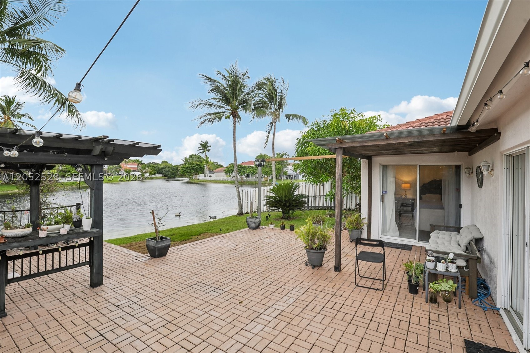 Enjoy peaceful lakefront views in this spacious 4 bedroom, 3 bathroom home, featuring the added convenience of a legal 3rd full bathroom and an attached two car garage!
Step outside and enjoy the lakefront water views from your own backyard, launch a kayak for a relaxing paddle, or simply unwind and enjoy the view. Whether entertaining family and friends or enjoying a quiet evening by the water, the backyard provides a unique setting to create lasting memories.
This home’s functional layout offers spacious living spaces with plenty of room for comfortable everyday living, hosting guests, or working from home; the attached two-car garage offers additional parking and storage.
Conveniently located near shopping, dining, parks, schools, and major highways, this home offers the perfect balance of peaceful waterfront living and easy access to everything Plantation and South Florida have to offer.
Don’t miss the opportunity to own a spacious lake front home!