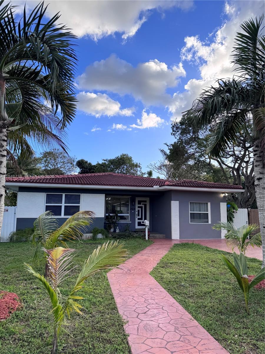 Fall in love with your captivating beachside sanctuary! This remodeled, move-in ready home features, new roof and modern kitchen and bathrooms: granite countertops, stainless steel appliances, porcelain tile floors, and remodeled bathrooms with glass shower enclosures. High-impact, hurricane-resistant windows. High demand area ideal for investors with ample space for a pool. Convenient location: close to restaurants, shops, downtown Hollywood, and the famous Hollywood Beach boardwalk, all just a 5-minute drive away.