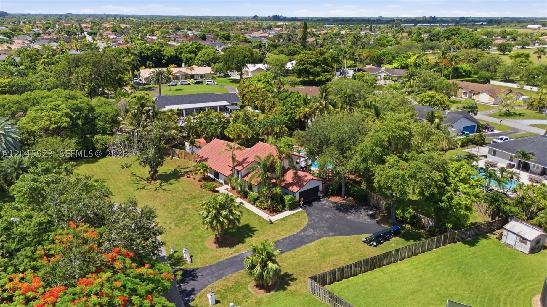 Discover the perfect blend of space, comfort, and privacy in this 4-bedroom, 2-bath home offering 3,026 total square feet on an impressive 3/4-acre lot. Thoughtfully designed for both everyday living and entertaining, the home features generously sized rooms, multiple living areas, and an inviting layout filled with natural light. The backyard is a private retreat with a sparkling pool, spa, expansive patio, and plenty of space for a boat, RV, or future additions. Conveniently located near the Florida Turnpike, Zoo Miami, shopping, dining, and highly rated schools, this is a rare opportunity to enjoy estate-style living with city convenience. VERY VERY Low $150 Per Year HOA