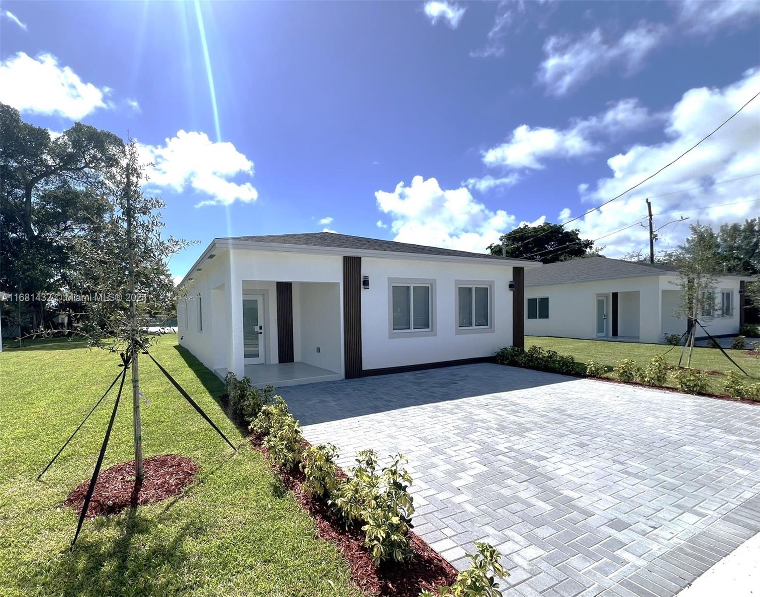 NEW CONSTRUCTION on a new Site Development of 5 Single Family Homes with no HOA. Quiet Street, Beautiful house with modern design, open kitchen concept and modern finishes. 1,560 Sqft. 3 bedrooms, 2 full baths, 1 Half Bath. Equipped with New stainless steel kitchen appliances, Quartz counter top, white kitchen cabinets made of pine wood, wall cabinets upgraded to 42'' height. Modern floors in glossy white big format Venatto porcelain tile throughout the house, Impact windows, concrete pavers driveway. Fast growing new Neighborhood. Very close to Aventura Mall, Ft Lauderdale Airport, and the beach.