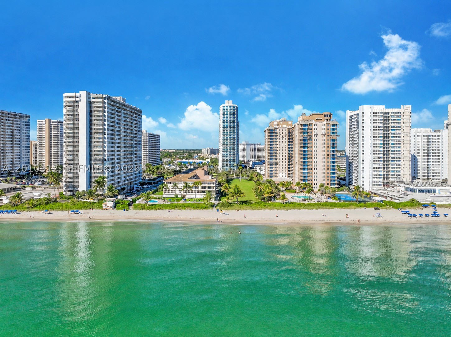 Experience refined waterfront living in this exceptional Intracoastal residence in Hallandale Beach, Florida, perfectly positioned across from the ocean. Enjoy sweeping water and skyline views in a serene setting where luxury meets coastal elegance. This well-maintained residence offers higher ceilings, a spacious open-flow design, and timeless finishes that create an atmosphere of comfort and sophistication. Every detail reflects effortless South Florida living at its finest. Indulge in resort-style amenities including 24/7 concierge service, valet parking, heated waterfront pool, state-of-the-art fitness center, elegant clubhouse, business center, and private marina access. Ideally located just moments from Aventura, Golden Beach, and Hollywood Beach, with easy access to Miami and Fort Lauderdale. A short drive connects you to world-class destinations including Gulfstream Park, Diplomat Golf & Tennis Club, fine dining, entertainment, and luxury shopping. Convenient proximity to Fort Lauderdale-Hollywood International Airport, Miami International Airport, Port Everglades, and PortMiami ensures seamless travel access. Perfect as a primary residence, seasonal retreat, or investment in one of South Florida’s most desirable waterfront communities. Live where others vacation—surrounded by water, sunshine, and the true essence of coastal luxury.