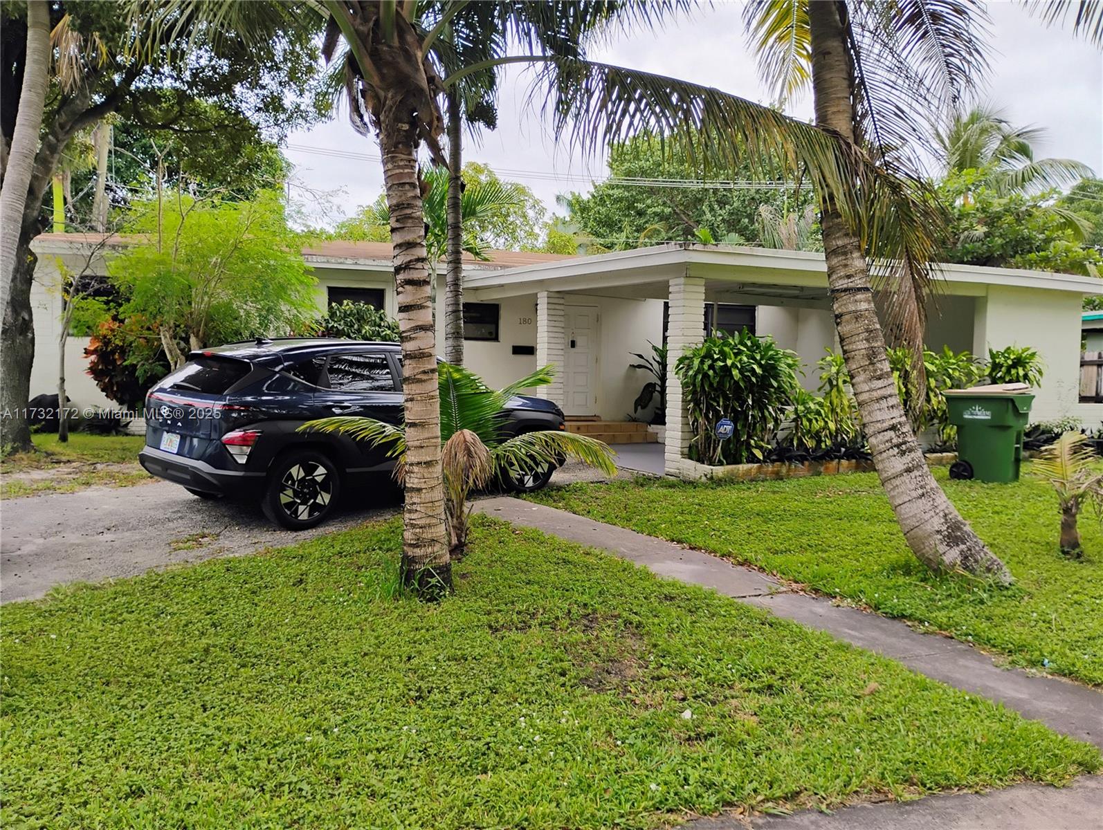Beautiful home nestled in quiet North Miami (NE) community. The spacious home features 3 bedrooms, 2 bathrooms, a laundry room / storage, and a covered carport with an extensive driveway for your convenience. The spacious backyard has fruit trees and provides privacy for family gathering & fun. Washer / Dryer included. Living sq ft: 1482. Location is near schools, parks, shopping centers, hospitals, and major highways.