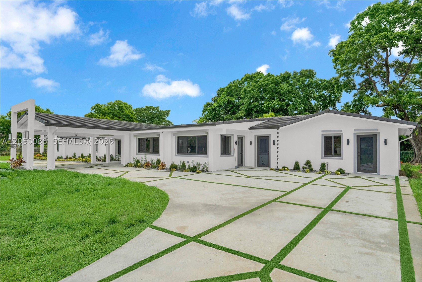Welcome to this beautifully updated 4809 sq. ft. home built in 1978 and thoughtfully renovated for today’s lifestyle. The property offers 6 bedrooms, 5 upgraded bathrooms, and a separate guest house/in-law suite, creating flexible options for extended living, visitors, or multi-use space.

Inside, enjoy 36x36 porcelain floors, impact windows and doors, a new roof, and a kitchen outfitted with premium Fisher & Paykel appliances. The primary suite provides a relaxing escape with a soaking tub, dual sinks, and walk-in closets featuring built-in shelving. A full surround sound system and cameras throughout add convenience and peace of mind.

Step outside to an 8,000 sq. ft. driveway, a 12x24 pool, and a remarkable 14-stall horse stable perfect for equestrian activities or hobby farming. With well water, septic, and generous outdoor space, this property blends comfort, utility, and recreation.

A unique opportunity to enjoy spacious living with thoughtful upgrades and standout amenities.

Step outside to enjoy an 8,000 sq. ft. driveway, a refreshing 12x24 pool, and a remarkable 14-stall horse stable—perfect for equestrian use or hobby farming. With well water, septic, and generous outdoor space, this property blends comfort, utility, and recreation.

A unique opportunity to enjoy spacious living with exceptional amenities.