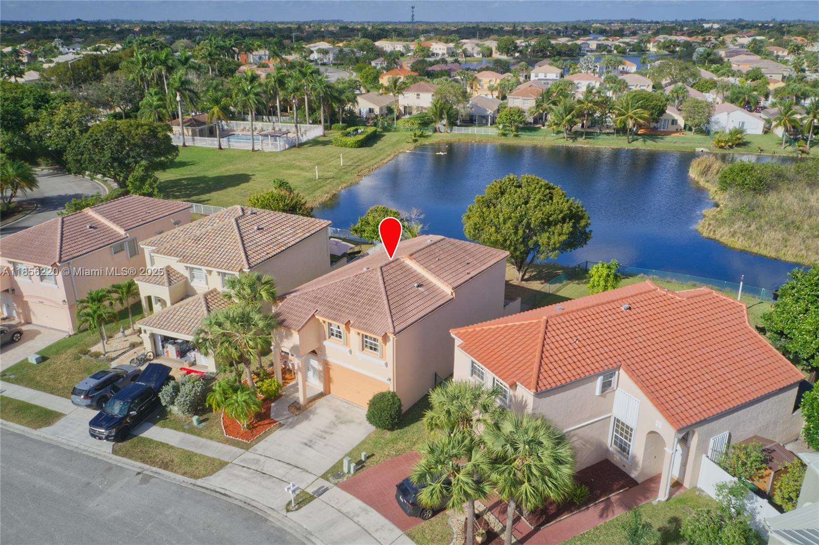 Welcome to your ideal family home in a sought-after neighborhood, perfectly located between Fort Lauderdale and Miami. This two-story residence features 4 bedrooms, 3 bathrooms, and a 2-car garage, just minutes from top-rated schools, shopping, dining, and major highways.

Enjoy an updated A/C, water heater, and tastefully remodeled kitchen and bathrooms. The spacious primary suite offers an in-suite bath and generous closet space, while a downstairs bedroom with full bath adds flexibility.

Step into your tranquil lakefront backyard, shaded by mature trees and a mango tree, perfect for relaxing or entertaining. Don’t miss this opportunity to enjoy the best of South Florida living!