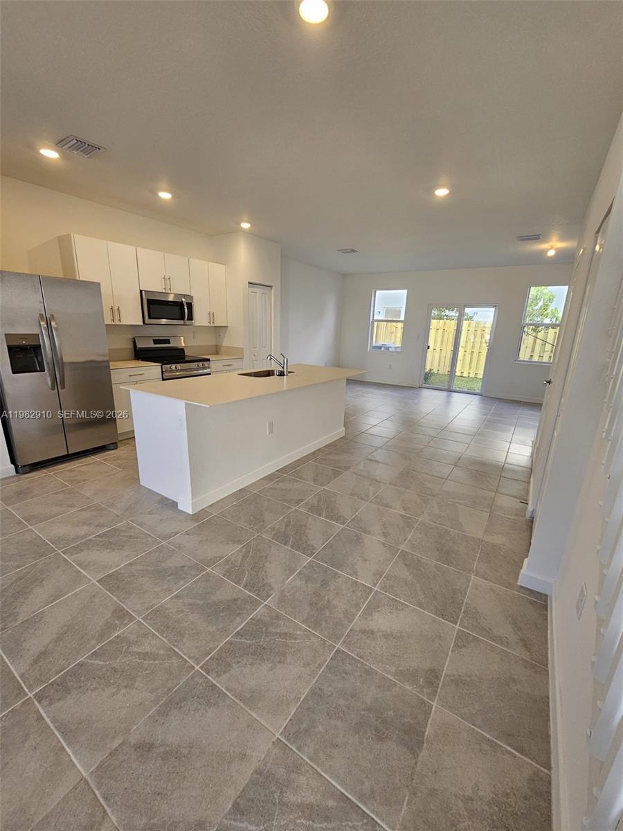 Rare four-unit townhome portfolio in Florida City, Florida — the southernmost municipality in Miami-Dade County. This package offering consists of four separate townhome units on individual folios (parcels), sold together as a single commercial investment deal. The units are not attached to each other and are fully leased, well-maintained, and deliver immediate, stabilized cash flow.With 100% occupancy, a proven rent roll, and a current cap rate of 6.48%, this asset is primed to deliver strong risk-adjusted returns from day one.Strategically positioned near the Florida Turnpike and US-1, the properties benefit from robust workforce housing demand driven by proximity to Homestead employment corridors, Everglades National Park, and the Florida Keys. With rental growth momentum throughout South Florida's most affordable submarkets, this portfolio of detached townhomes represents a compelling acquisition opportunity for value-add and income investors alike.