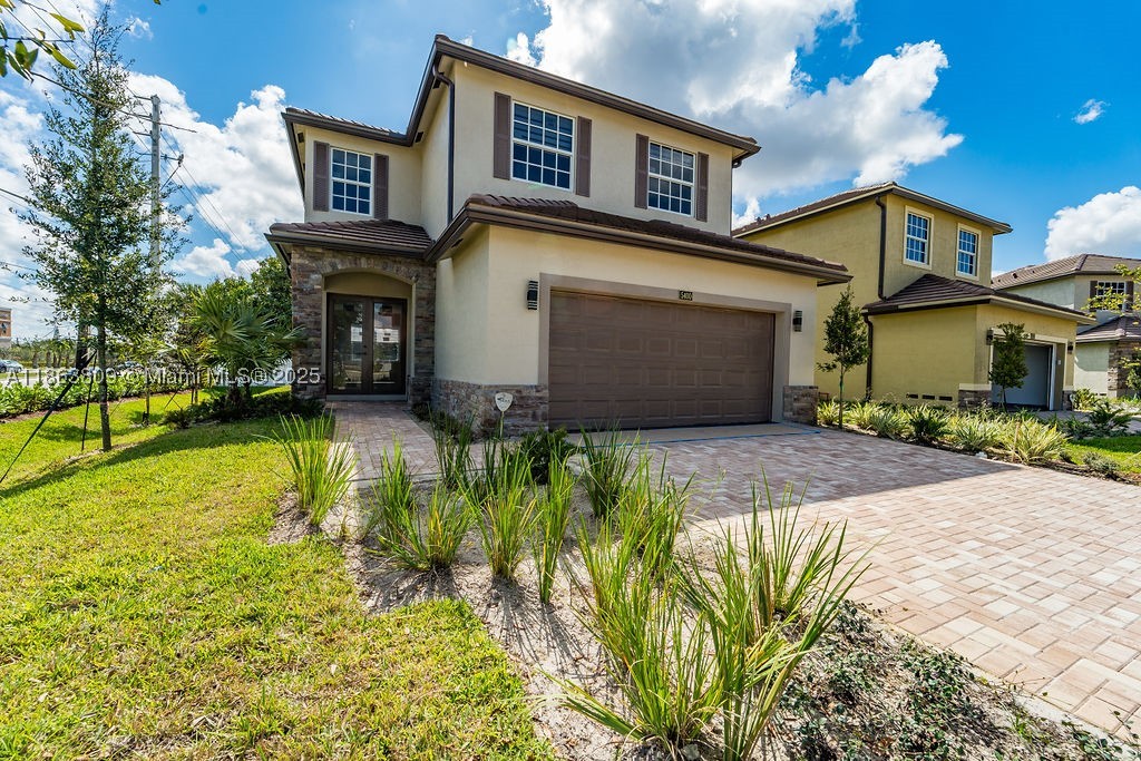 Brand-new construction in Tamarac offering the perfect blend of modern comfort, safety, and everyday convenience. This beautiful 4-bedroom, 2.5-bath home features a spacious two-car garage, impact hurricane windows, zebra blinds, epoxy garage floors, and a built-in fire sprinkler system for added peace of mind. Located in a desirable walled community, the home also includes a 10-year builder warranty.

Conveniently located close to the Turnpike for easy commuting to Miami-Dade and Palm Beach Counties, and near hospitals, shopping, dining, and everyday essentials.

Special consideration is being given to veterans — ask about the special program available for qualified buyers.

A rare opportunity to own brand-new construction in a central Tamarac location with security, style, convenience, and possible veteran-focused benefits all in one package.
