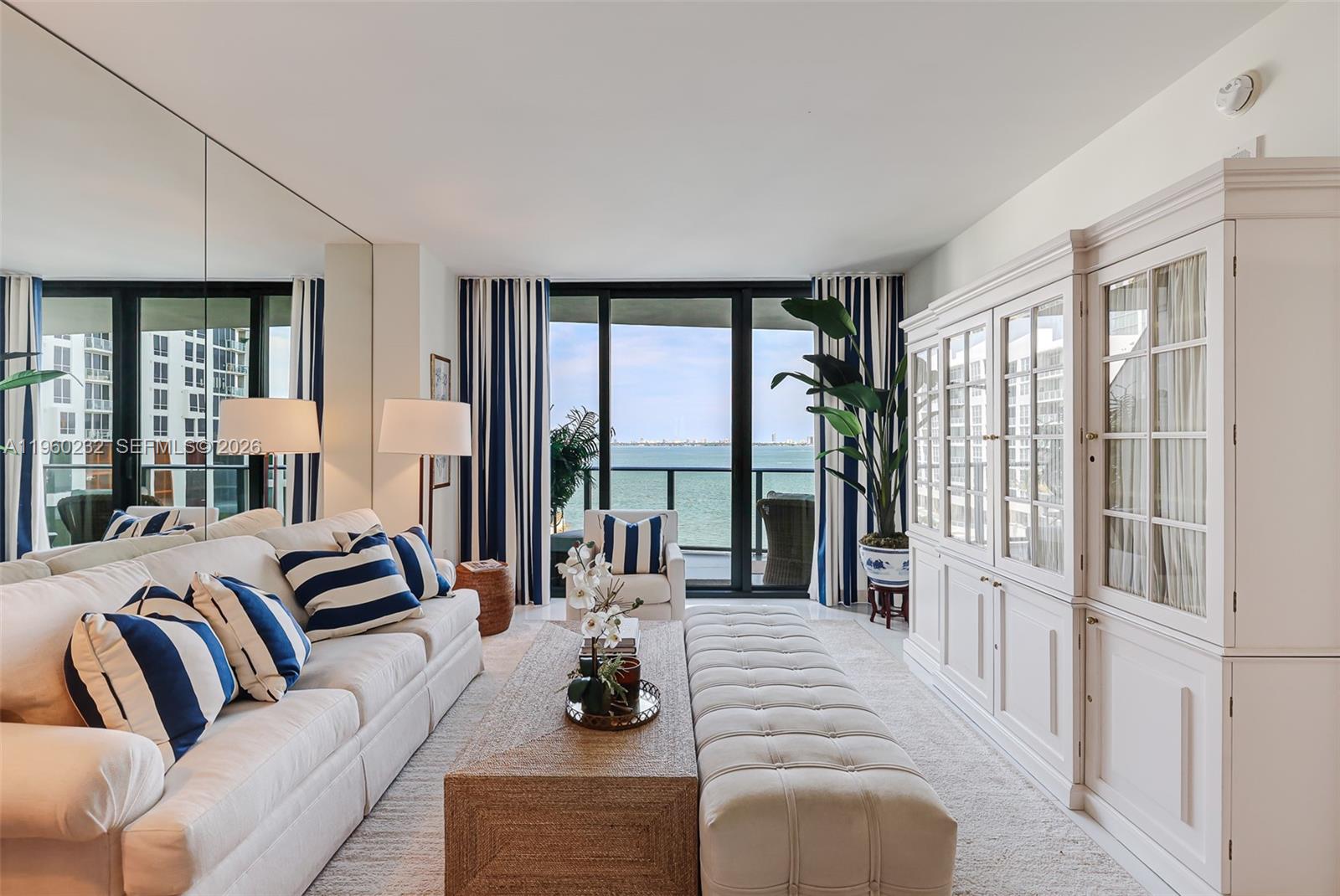Welcome to the exquisite Icon Bay furnished condo, where luxury meets comfort in the heart of Miami! This stunning 2-bedroom, 2-bathroom unit is not just a home; it's a lifestyle choice that embodies the very essence of resort-style living. Imagine stepping into a space that boasts private elevator access, soaring 9-foot-high ceilings, and floor-to-ceiling glass windows that flood the interior with natural light while offering breathtaking views of the Bay and the iconic Miami Beach skyline. The condo is meticulously designed for your convenience and enjoyment. The sophisticated wood cabinetry complements the modern aesthetic, while the in-unit washer and dryer add to the ease of living. Step out onto your private balcony and immerse yourself in the serene bay views that surrounds you.